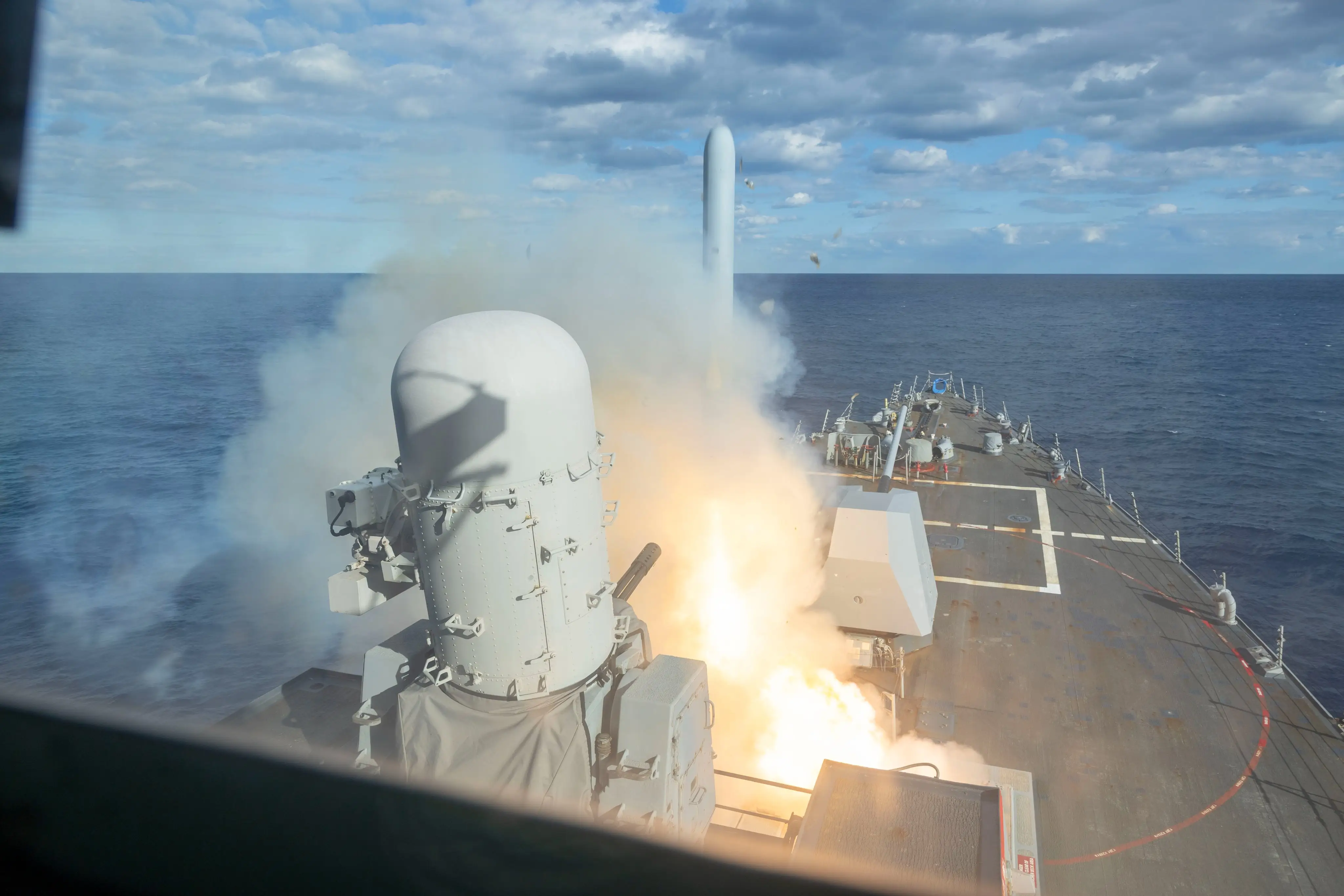 A missile launches from a US warship during operations against Iran.