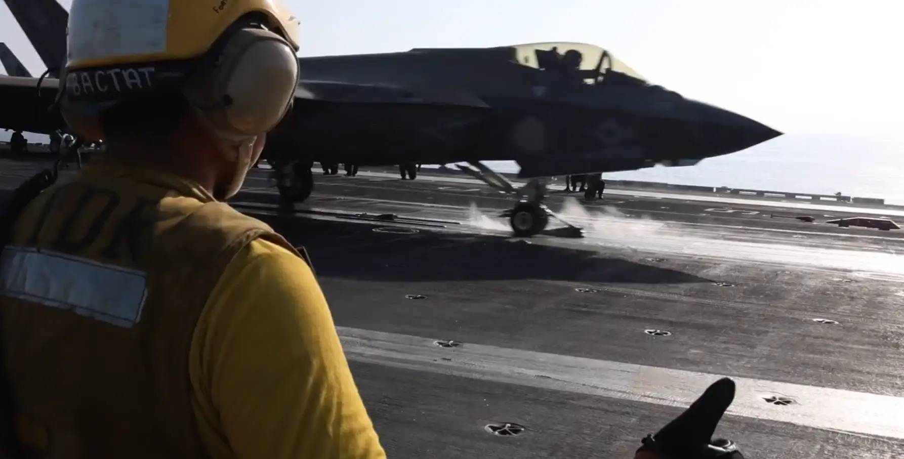 An American aircraft launching off a carrier in support of operations against Iran.