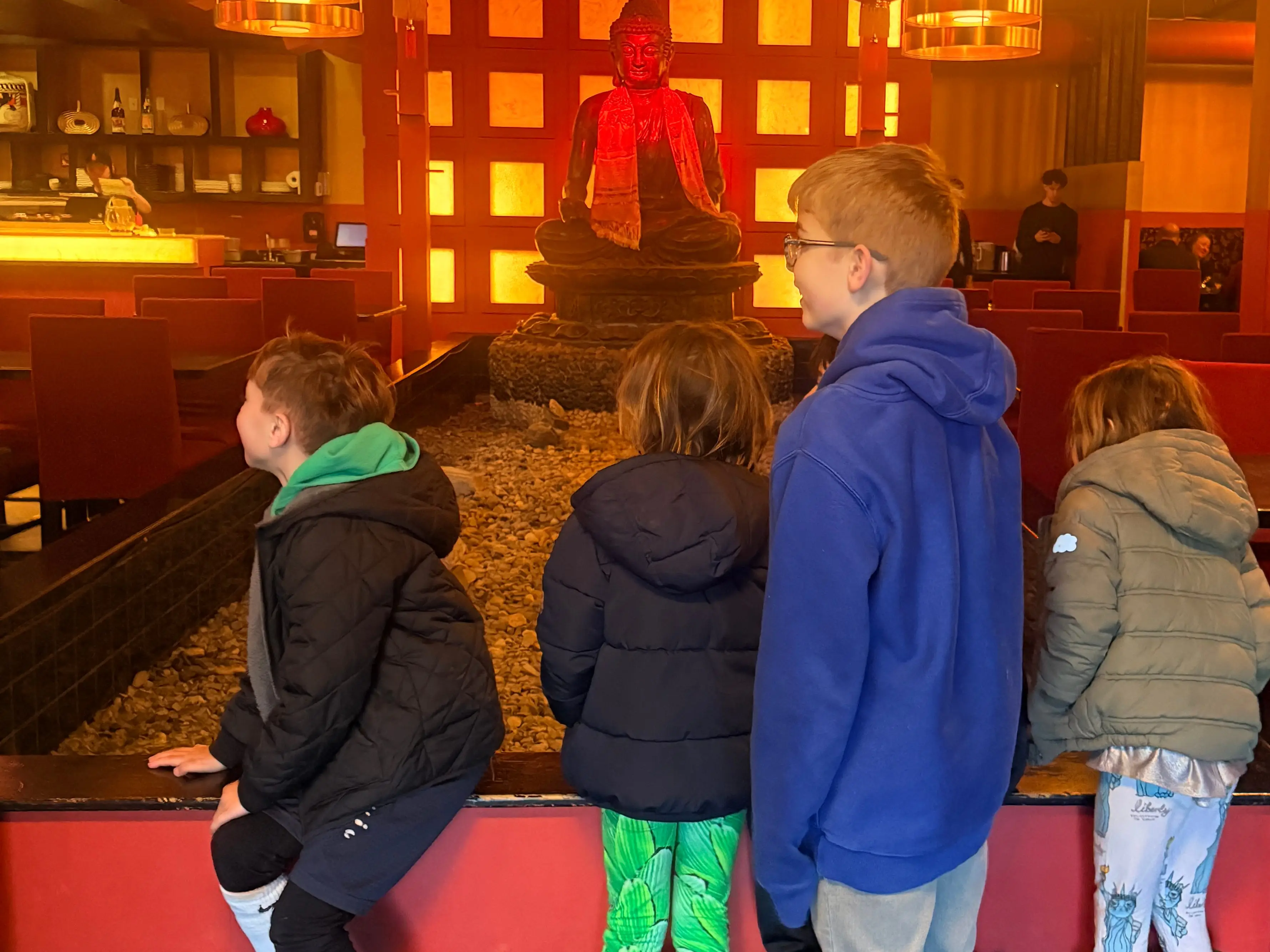 Kids waiting on a restaurant