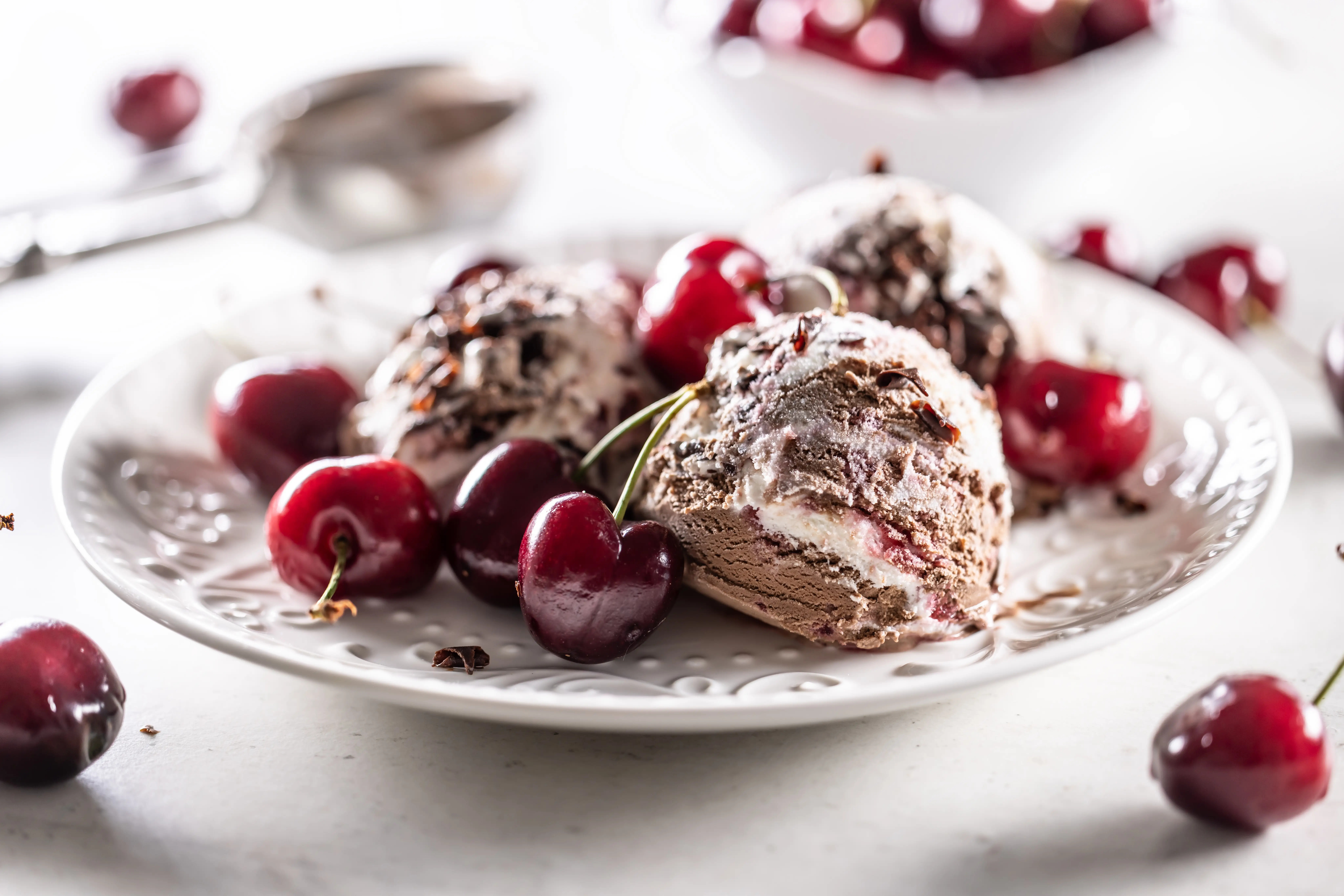 Chocolate ice cream with cherries.