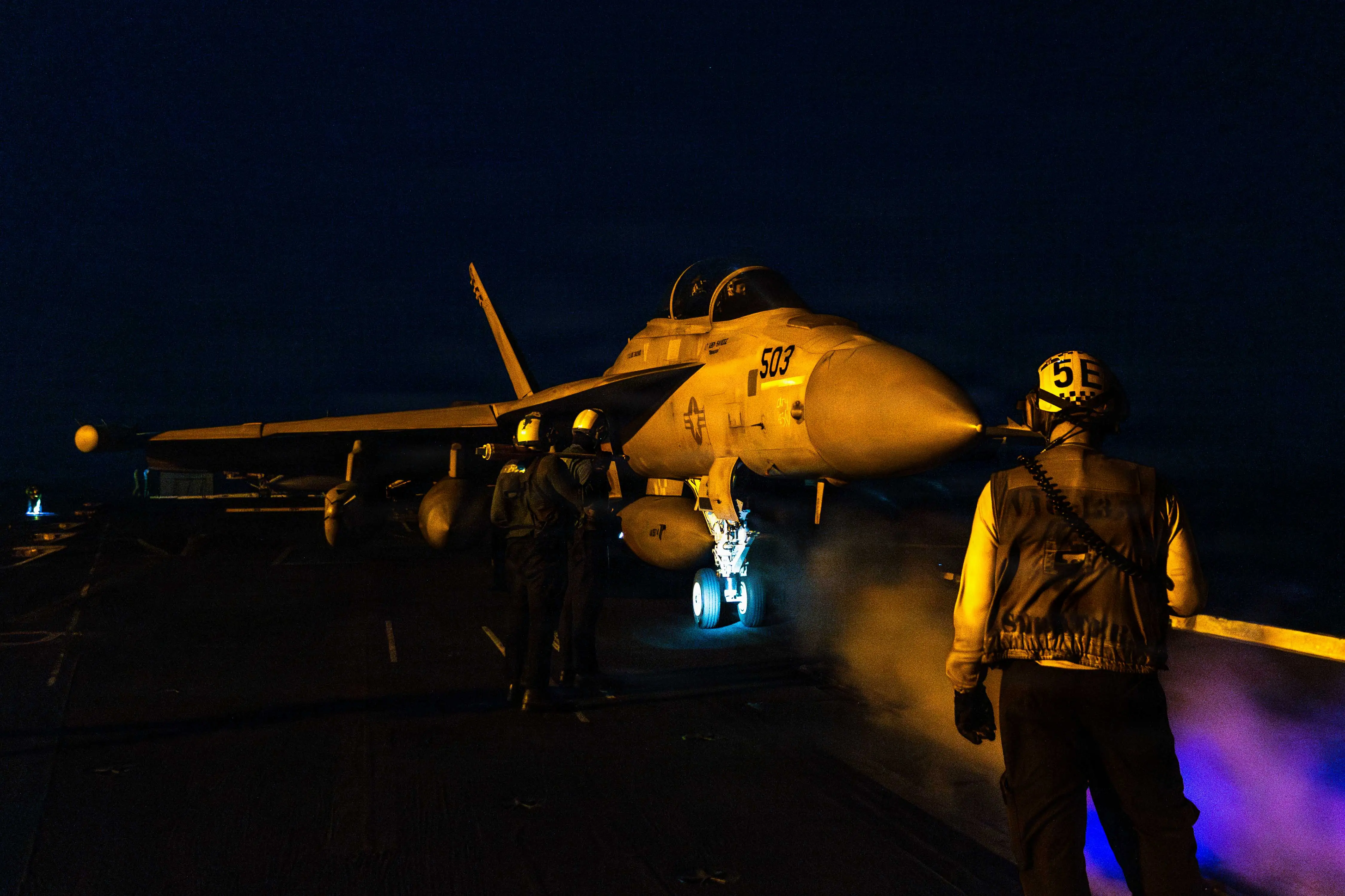 An EA-18G Growler, attached to Electronic Attack Squadron (VAQ) 133, prepares to launch from the flight deck of Nimitz-class aircraft carrier USS Abraham Lincoln in support of Operation Epic Fury, March 1, 2026.