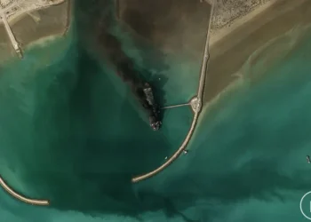 Satellite image shows Iran’s largest naval vessel, a tanker-turned-warship, smoking in port