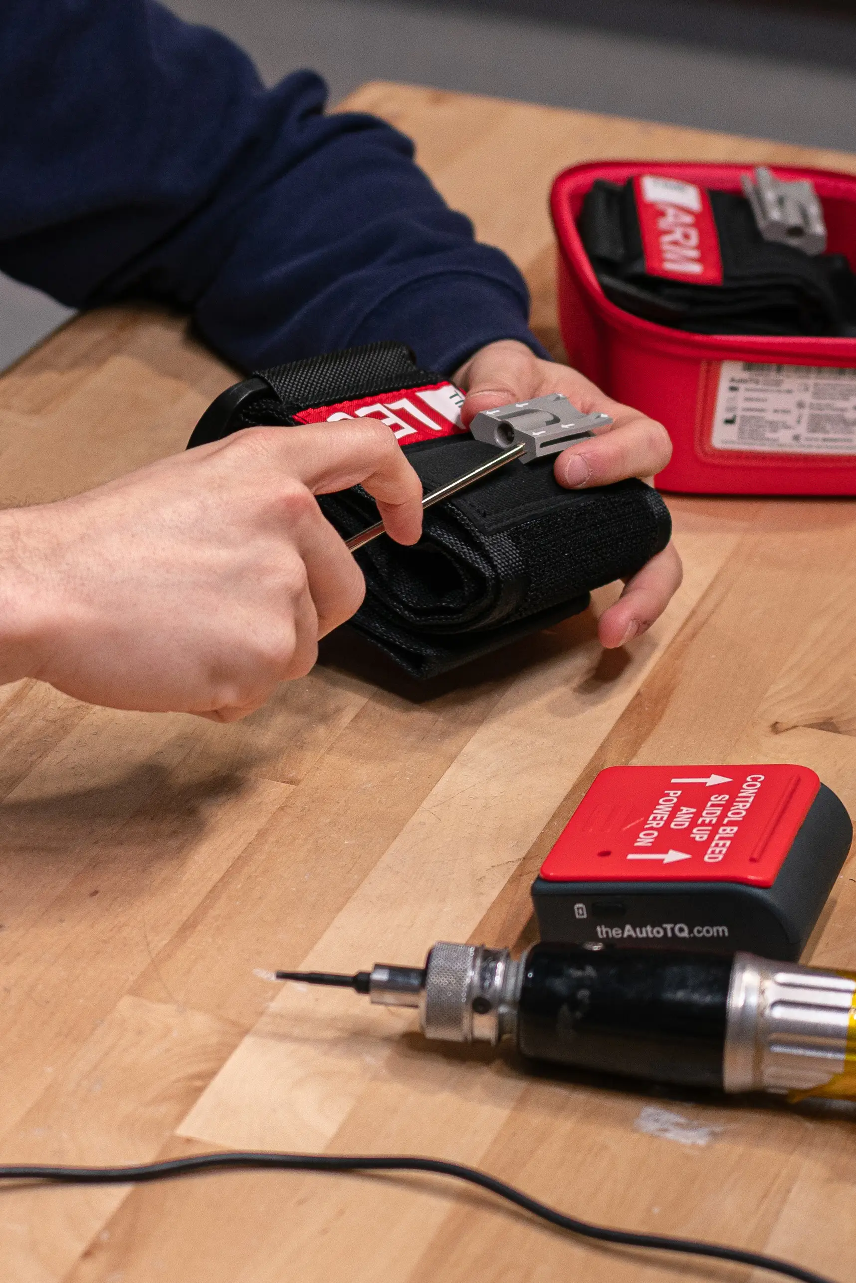 Max Herbst assembles an AutoTQ inflator at the company headquarters in Boca Raton, Florida on March 2, 2026. Hannah Herbst developed the automated tourniquet after learning about the frequency of blood loss deaths. (Photo by Jennifer Ortiz)