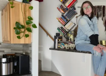 I live in a 400-square-foot tiny home. See inside my space, from clever storage solutions to unavoidable chaos.