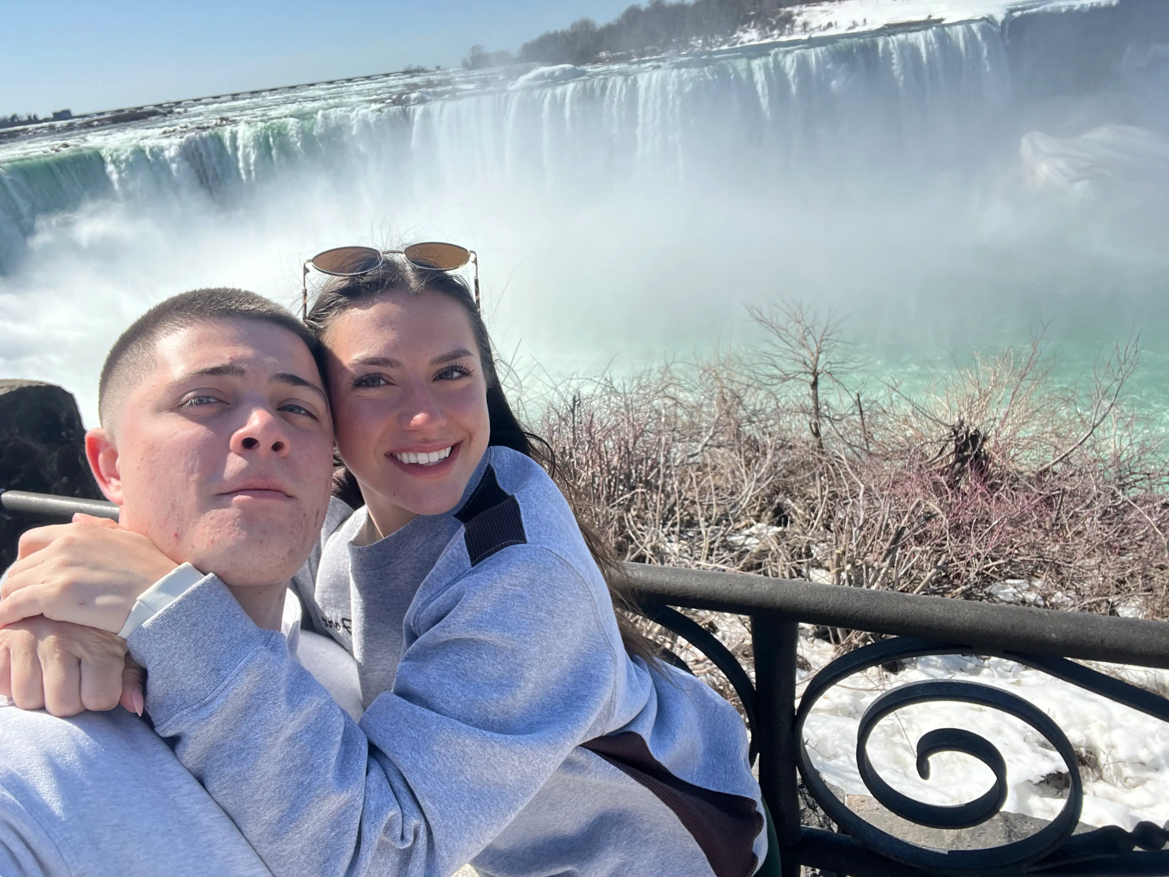 Amanda and her boyfriend take a selfie in Niagara Falls.