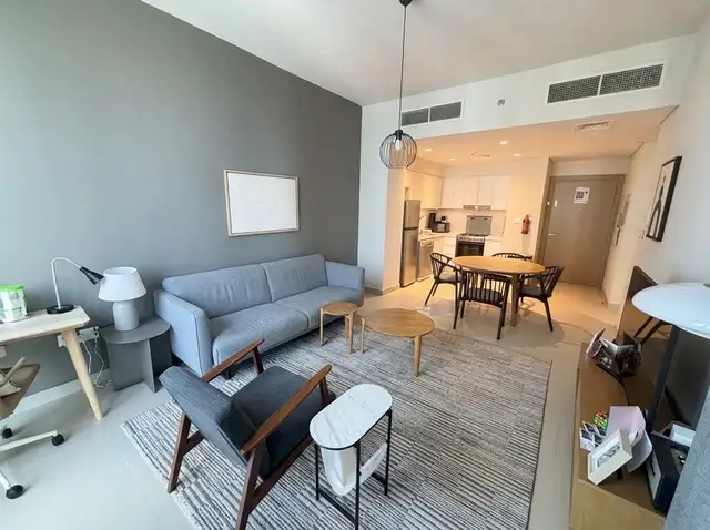 A bedroom altered by AI to clean up a mess.