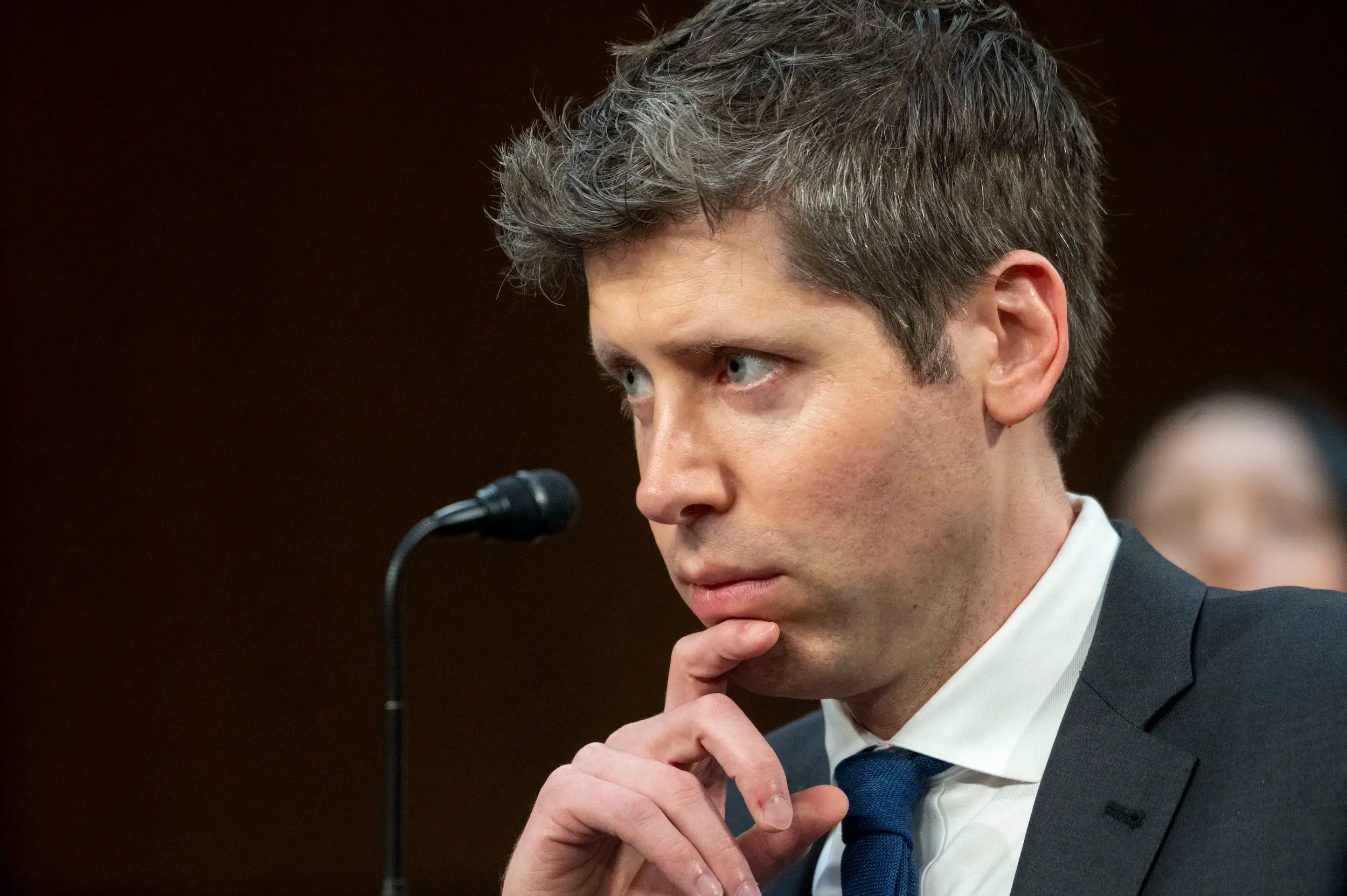 Sam Altman looks ahead during congressional testimony