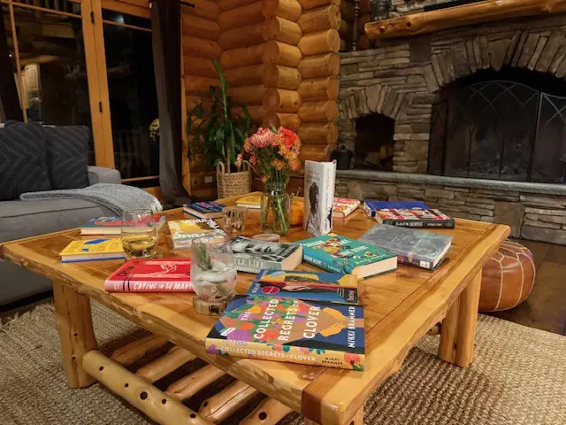 Wood table with books on it