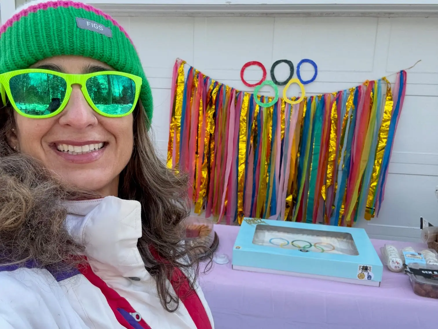 Woman posing with birthday cake