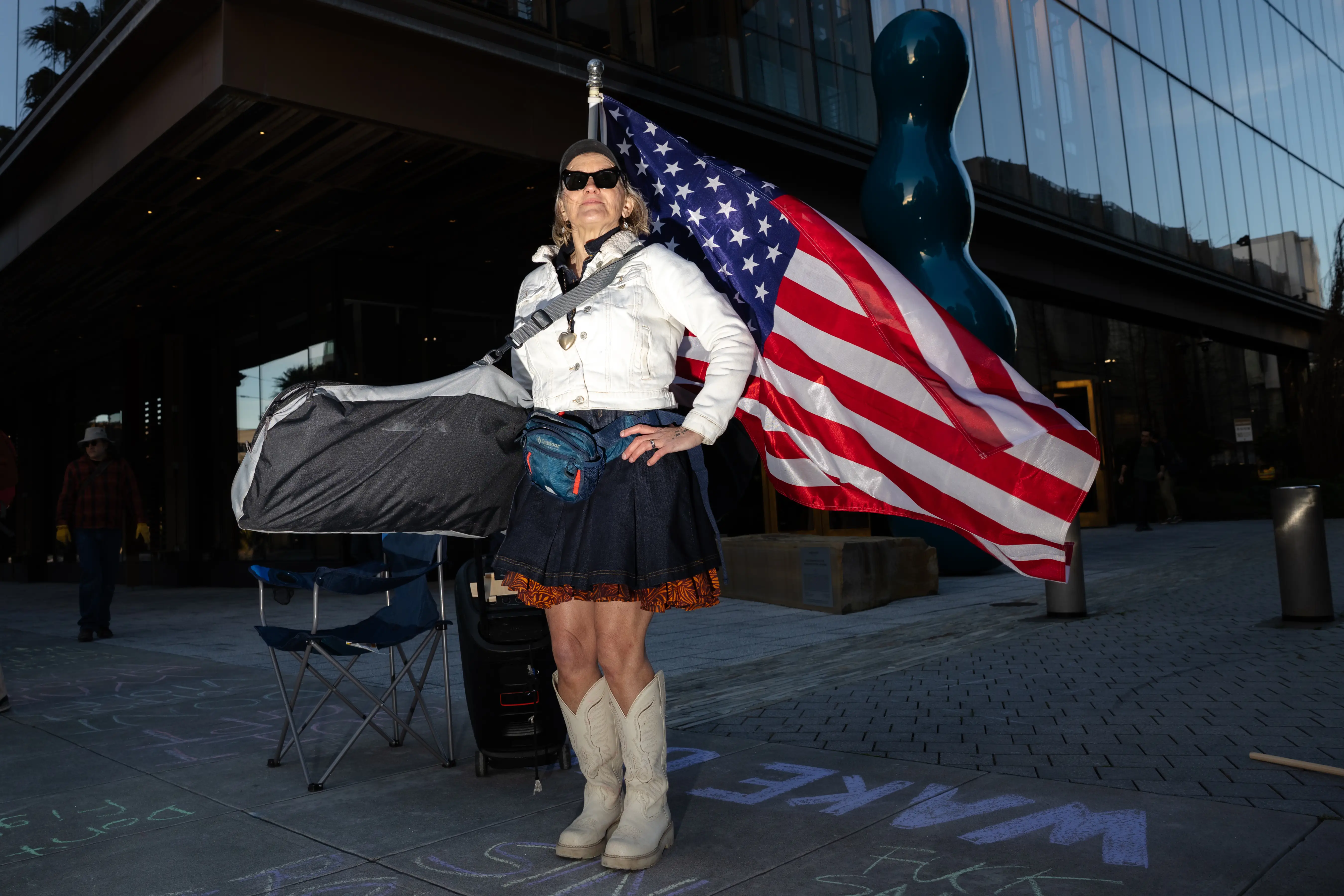 Megan Matson poses for a portrait after a protest against Open AI took place outside of their headquarters in San Francisco.