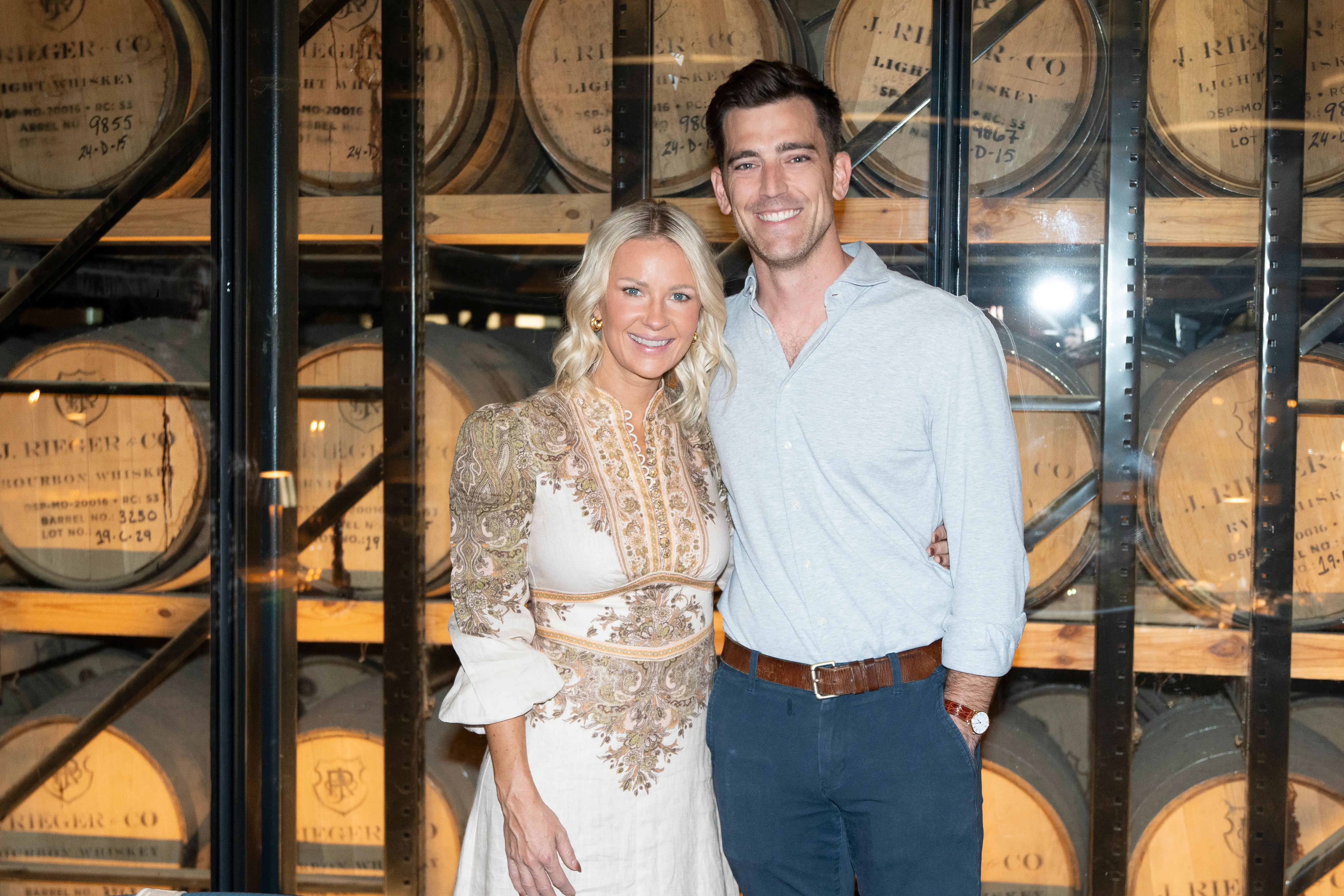 Lucy and Andy Rieger standing by their distillery, J. Rieger & Co.