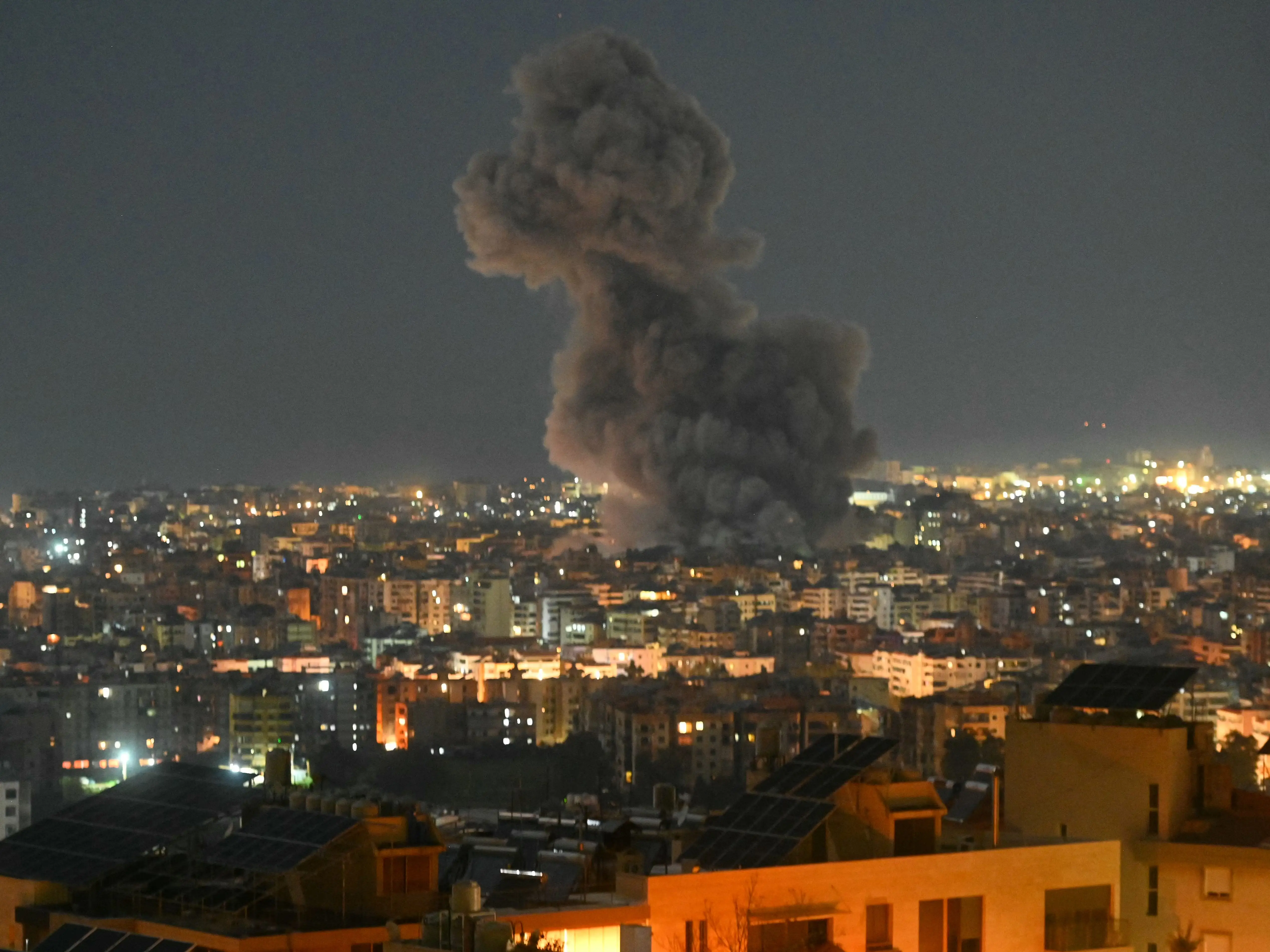 Smoke rises from the site of an Israeli airstrike that targeted the office of the Hezbollah affiliated Al-Manar TV station in Beirut's southern suburb of Haret Hreik on March 3, 2026.