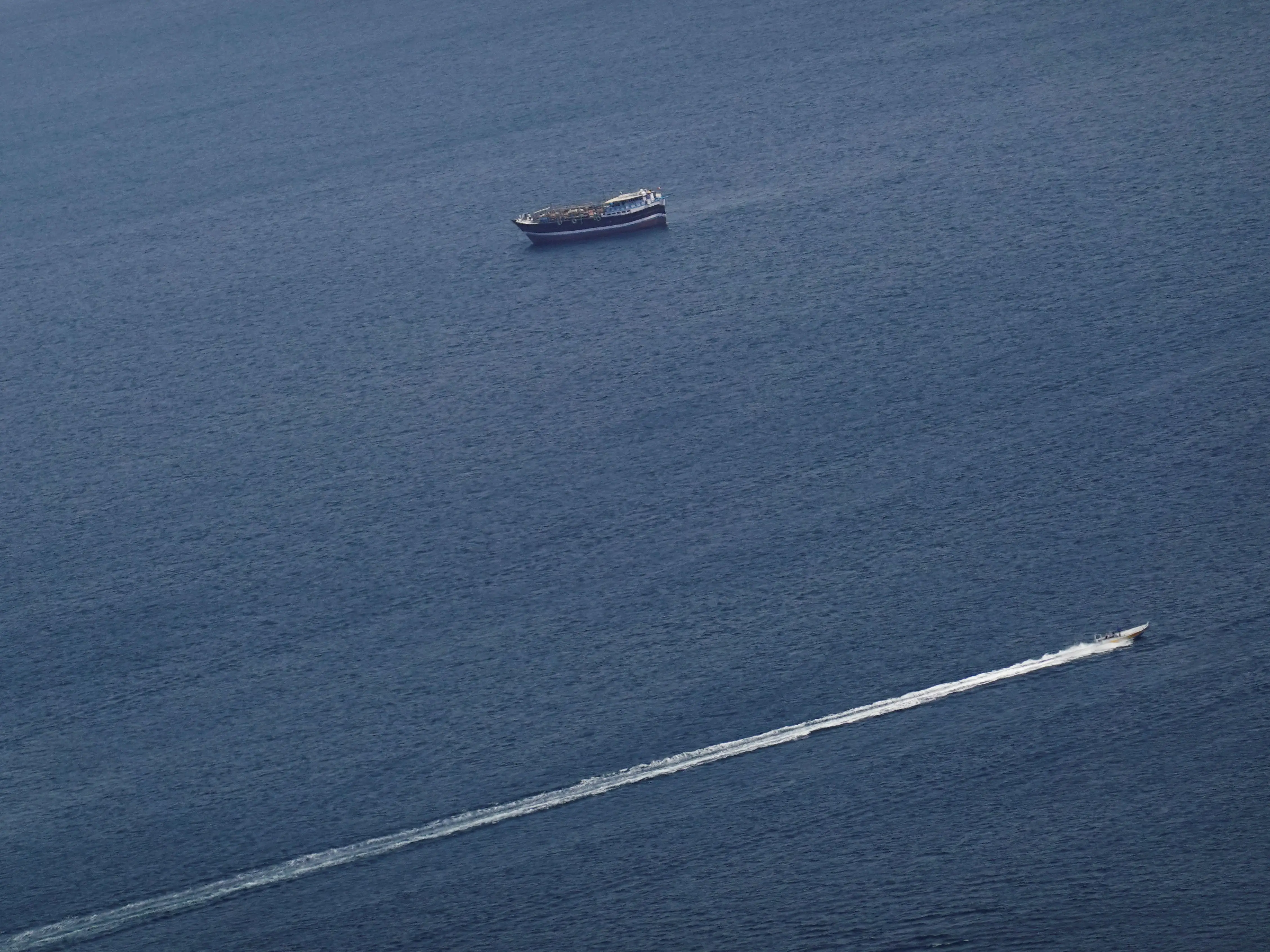 Boats in the Strait of Hormuz amid the U.S.-Israeli conflict with Iran, as seen from Musandam, Oman, March 2, 2026