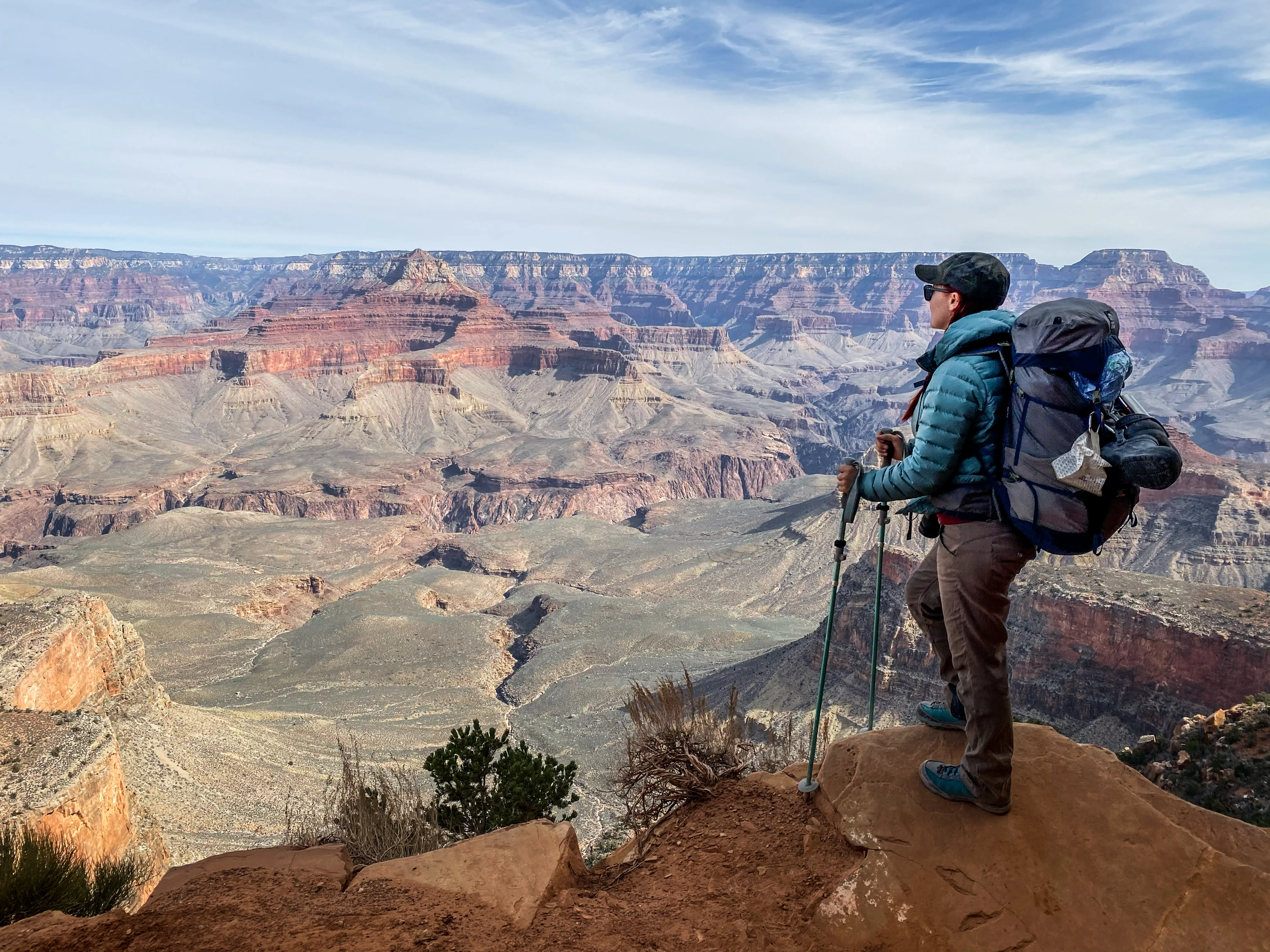 Author Emily Pennington standing wih backpack in GRand Canyon