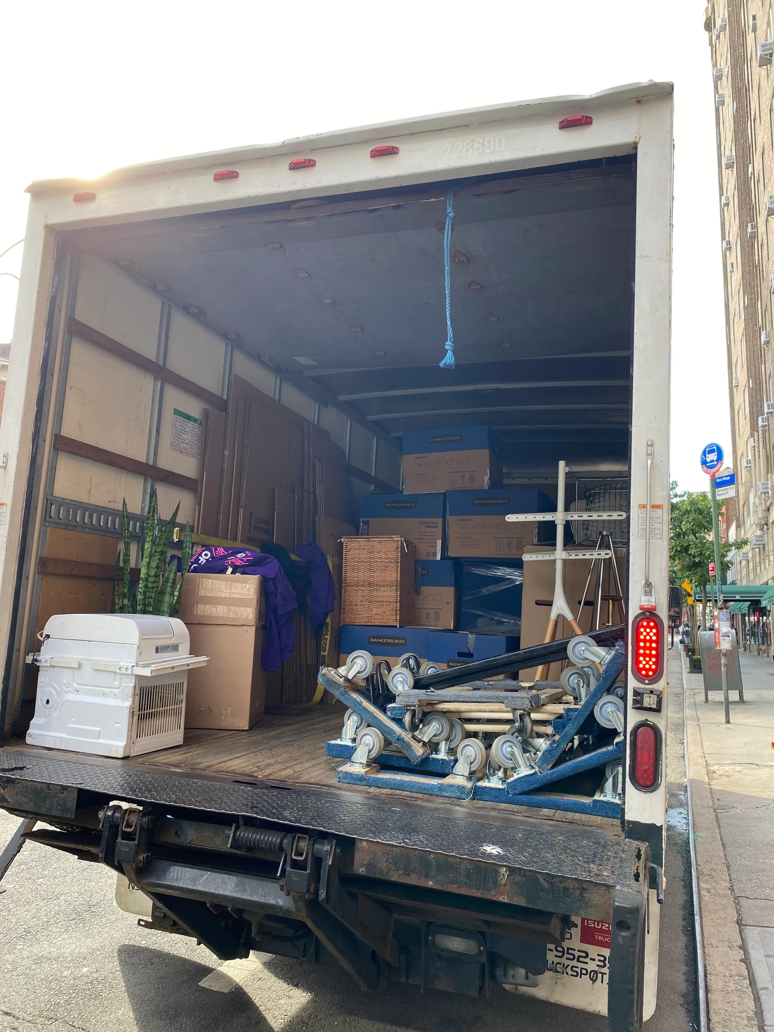 Anahid S. Modrek's moving truck filled with boxes