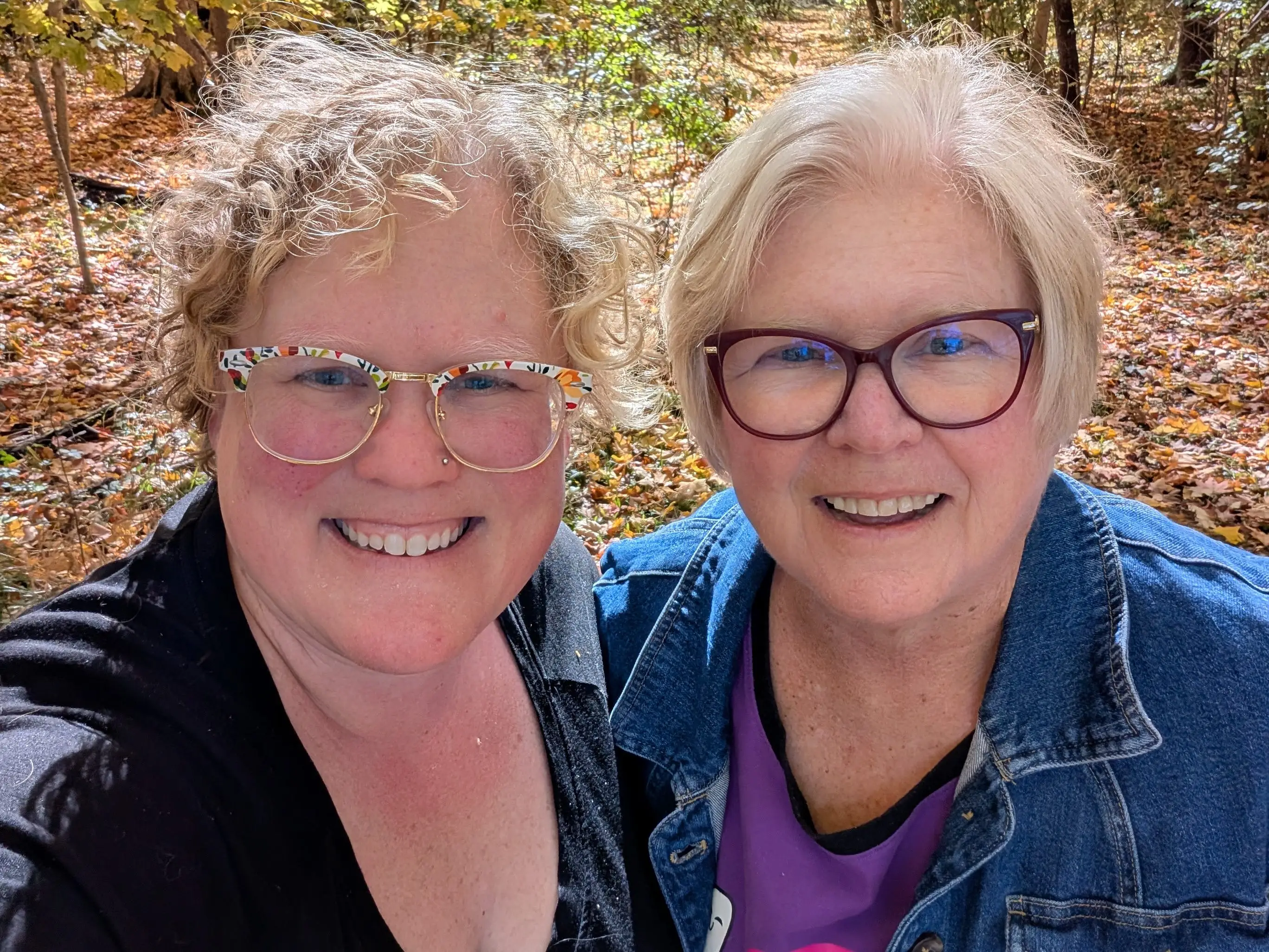 Mom and daughter posing for selfie.