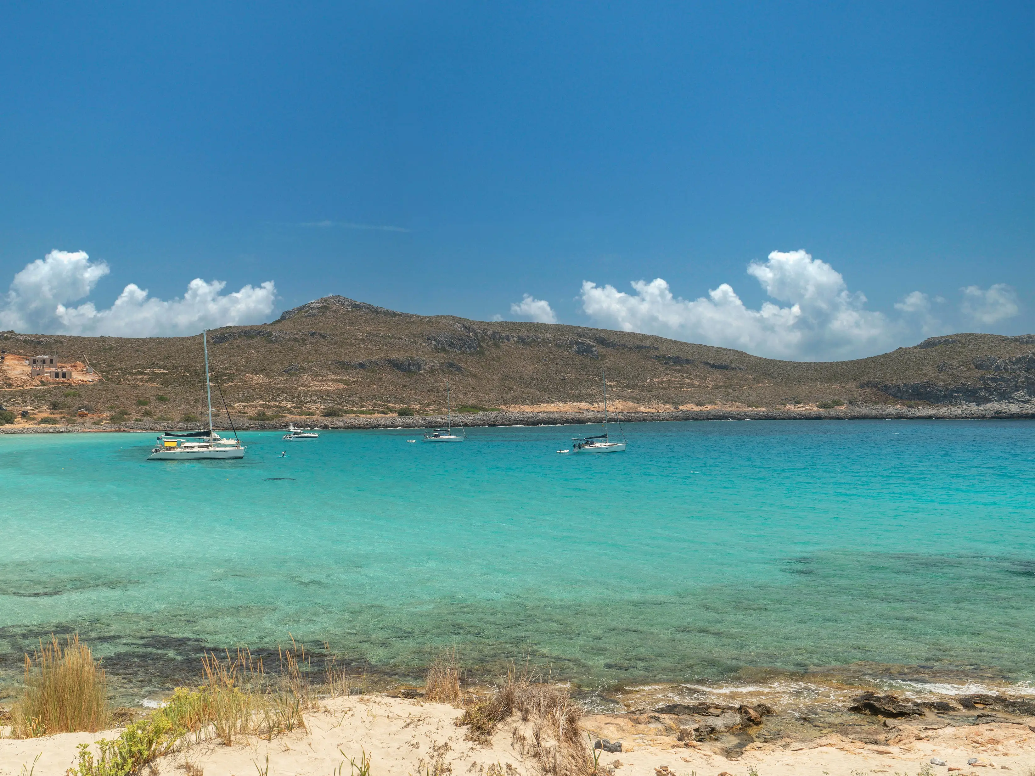 Boats in the water on an island in Greece.