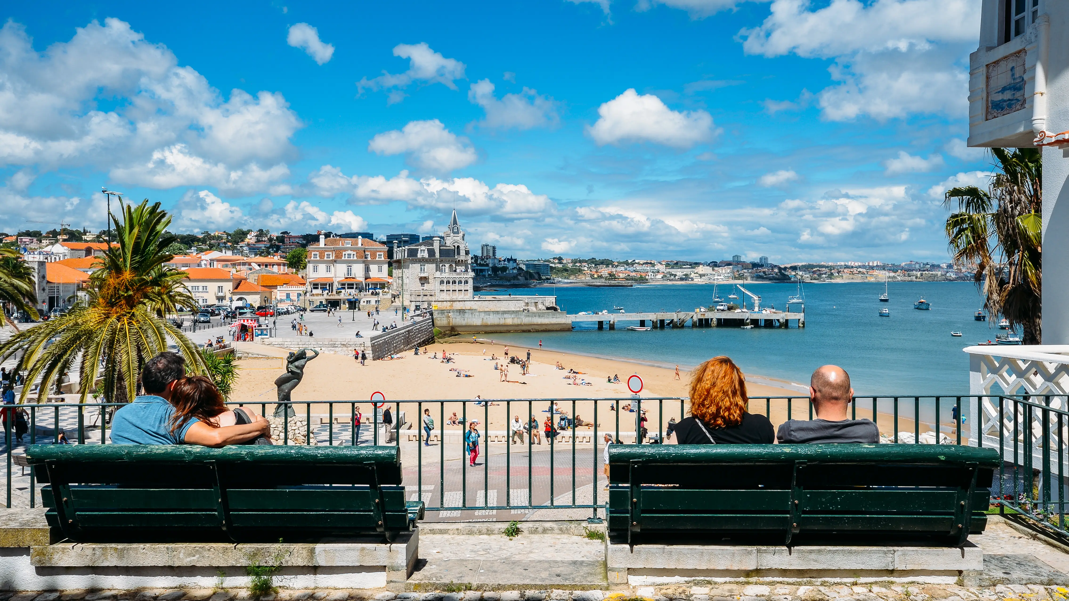 Couples on benches in Cascais, Portugal  portugal