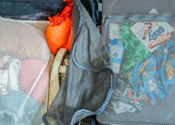 I took a 7-day cruise with carry-on luggage and a backpack. See everything on my packing list and how I organized it all.