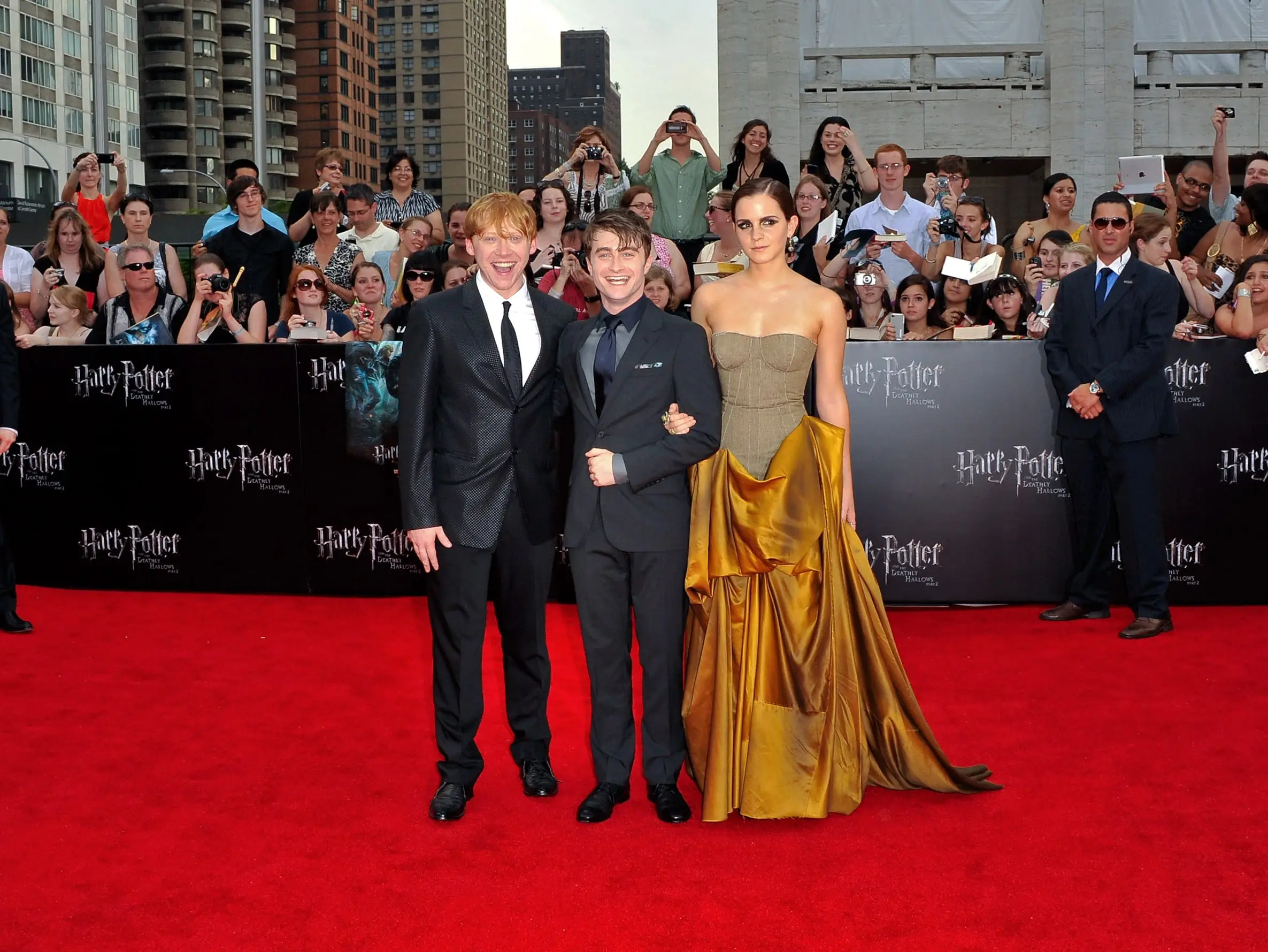 Rupert Grint, Daniel Radcliffe, and Emma Watson attend the premiere of 