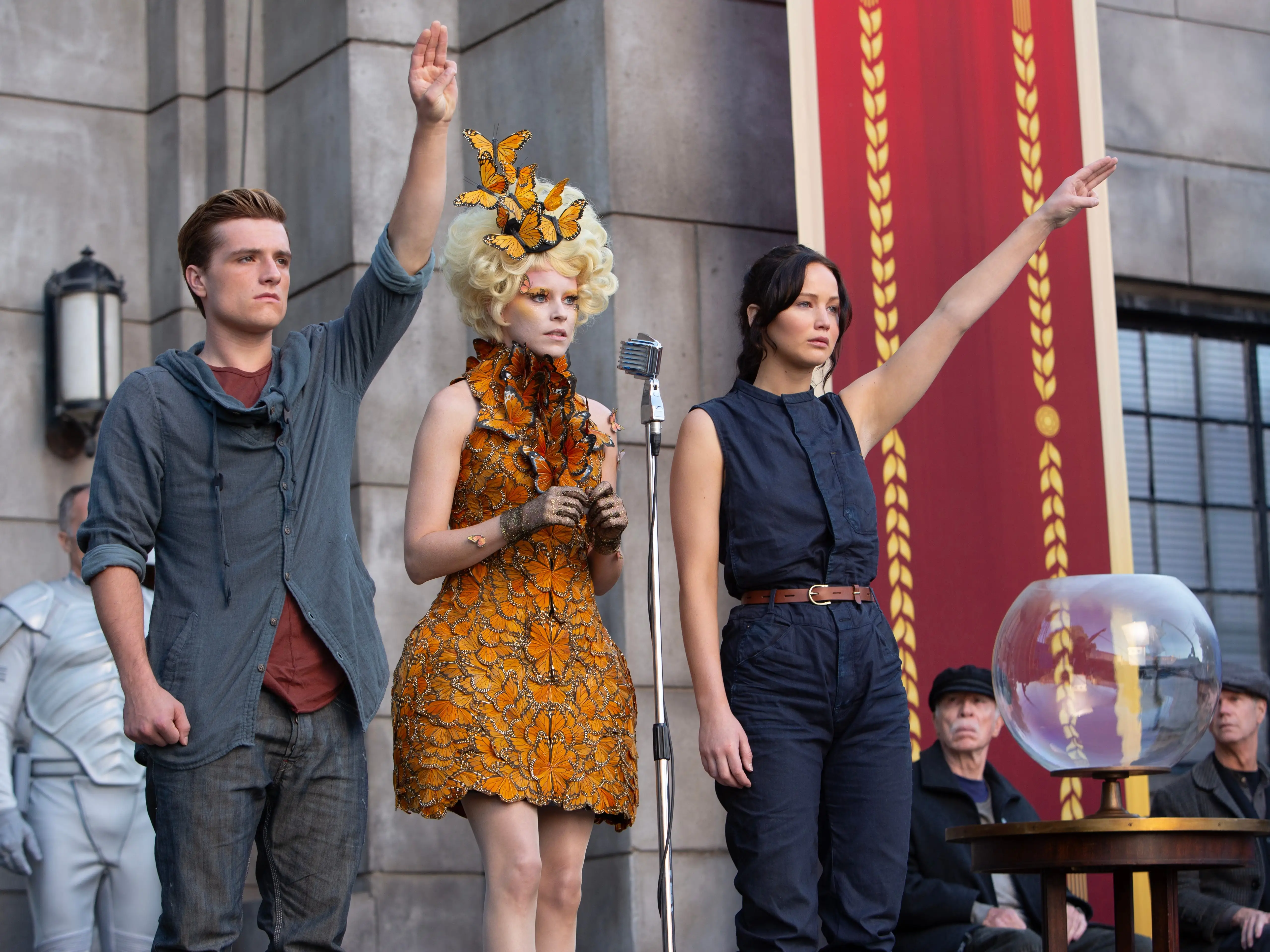 Actors Josh Hutcherson, (L) Elizabeth Banks (M) and Jennifer Lawrence (R) on the set of the film, 