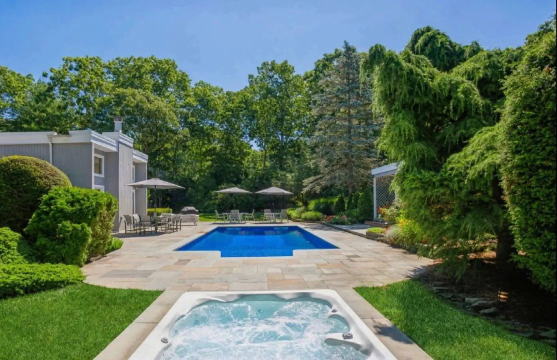 The Hamptons backyard where the youngest accuser in the Alexander brothers sex-trafficking trial says she was raped after being handed a drugged drink in hot tub.