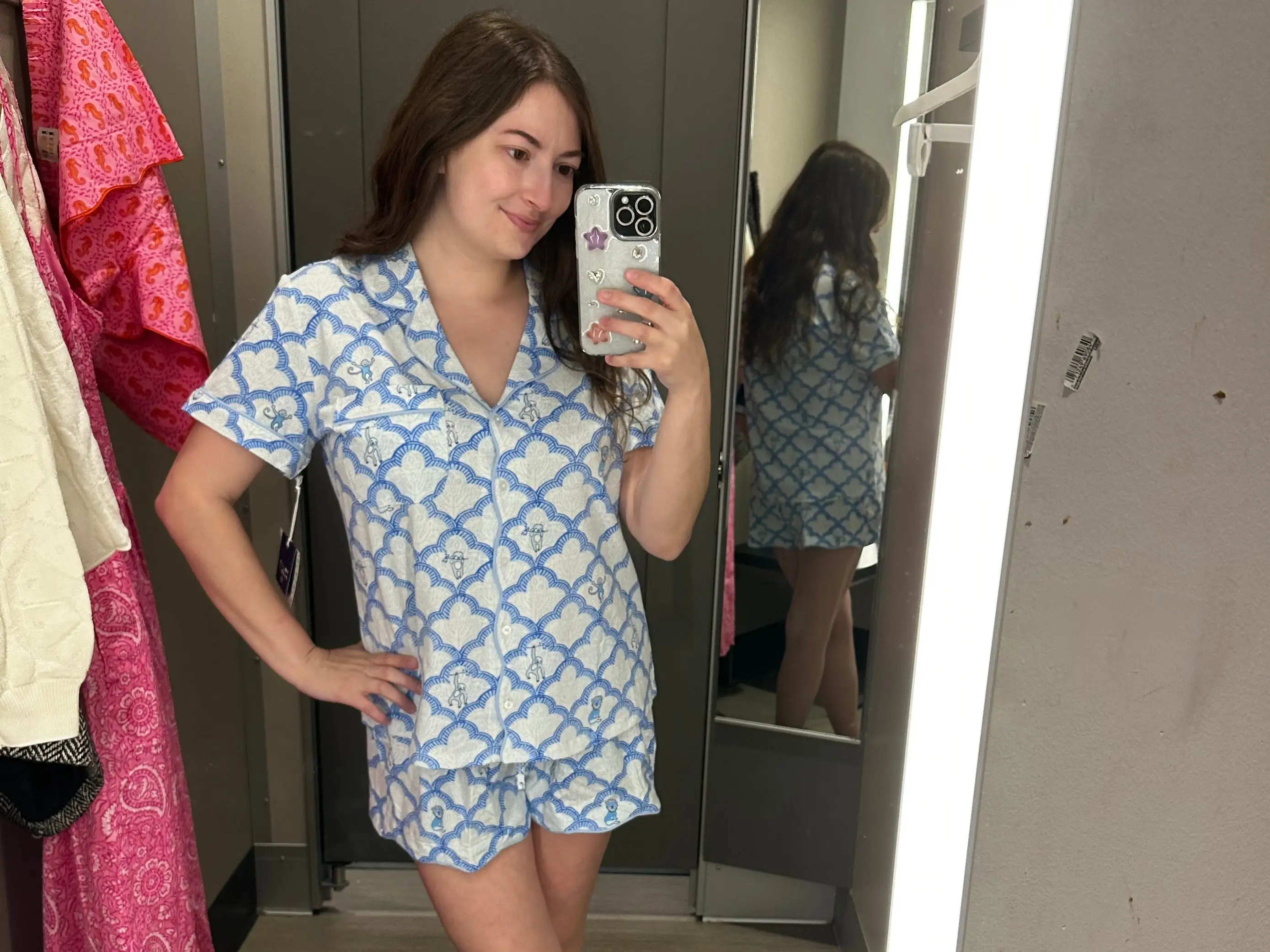 Reporter Amanda Krause tries on Roller Rabbit pajamas at Target.