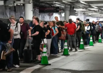 Photos show TSA lines clogging airports and snaking into parking garages during partial government shutdown delays