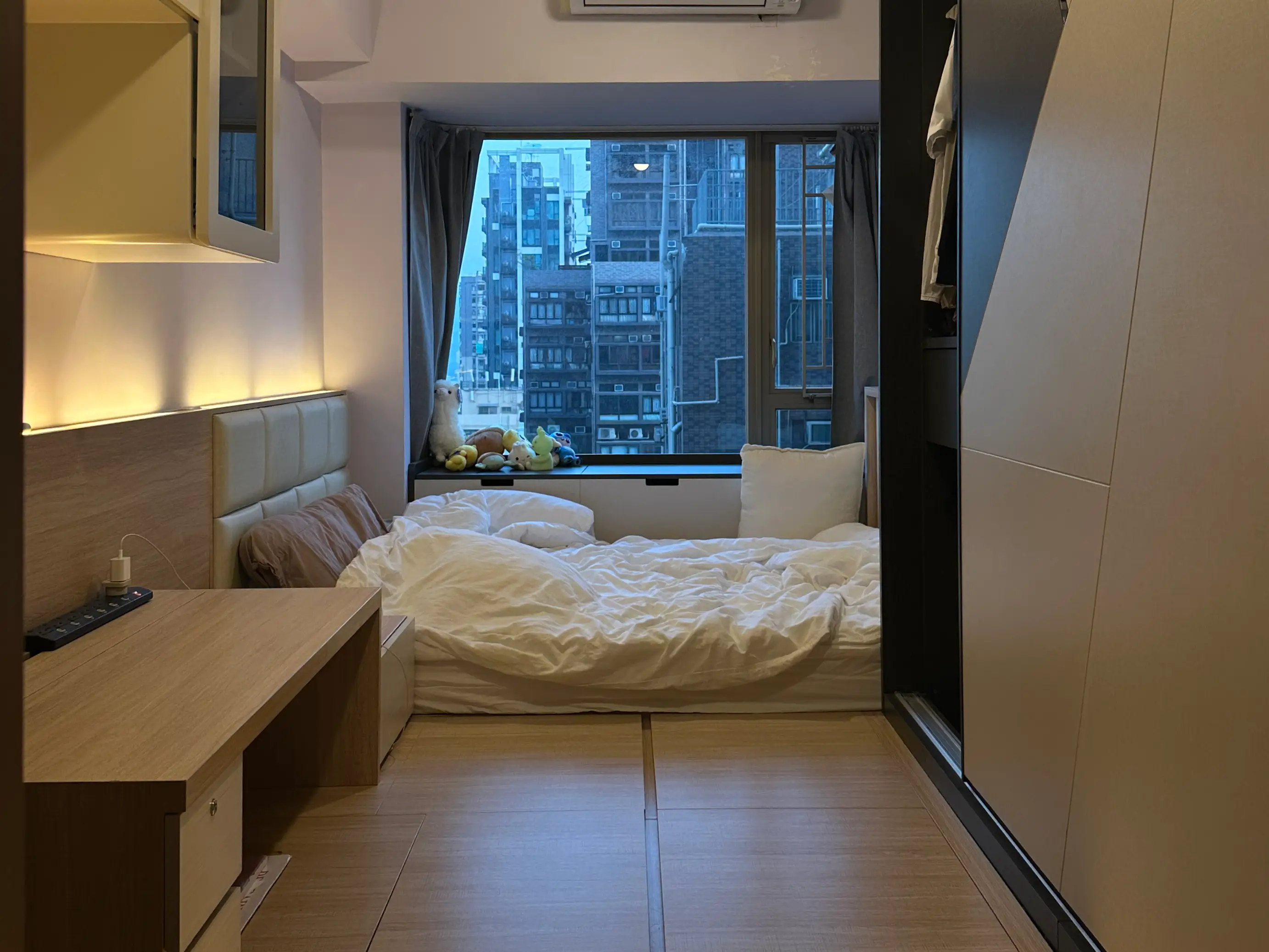 A bedroom in an apartment in Hong Kong.