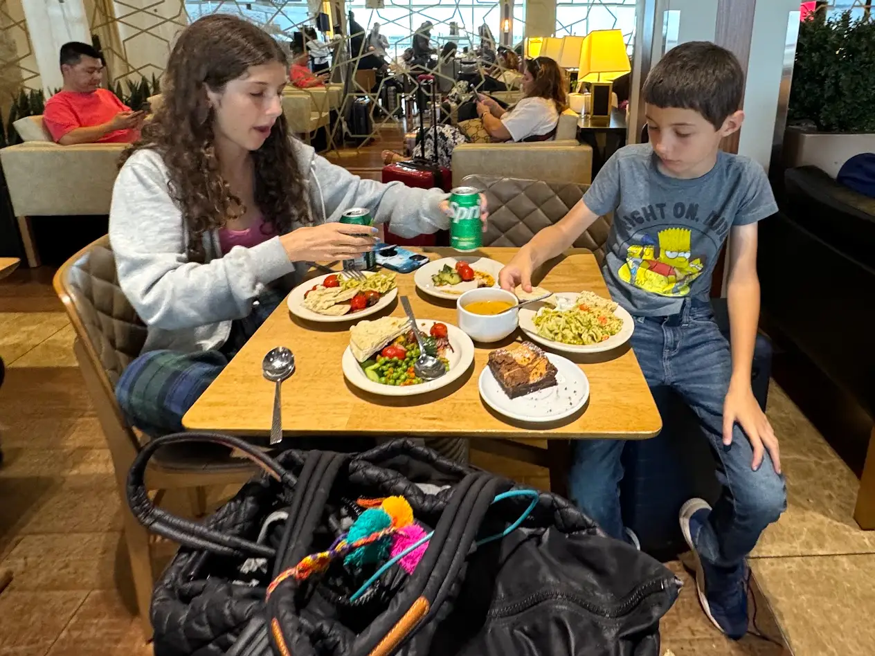 Jamie Davis Smith's kids in an airport lounge