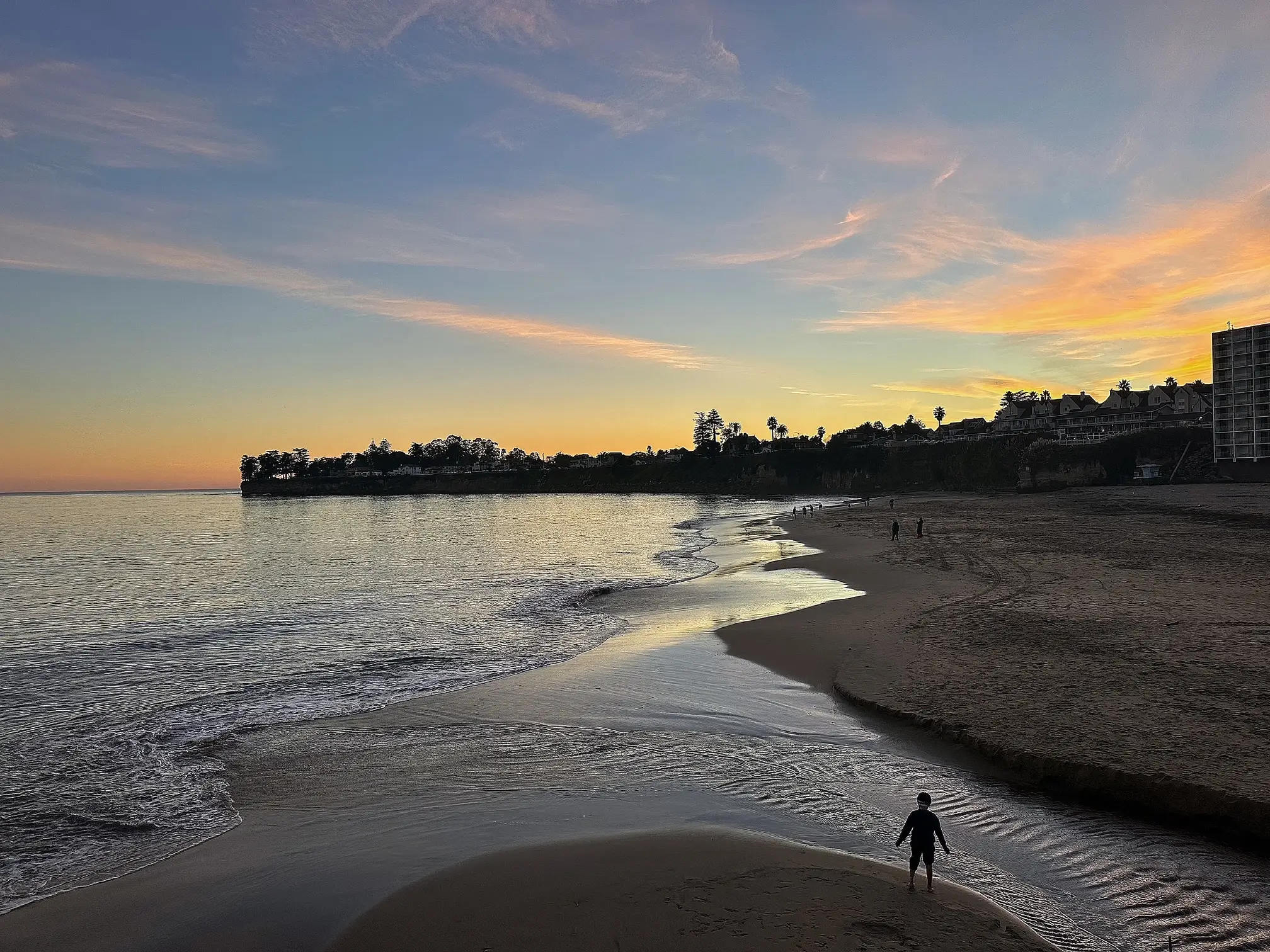 A picturesque shot of the beach in Santa Cruz at sunset.