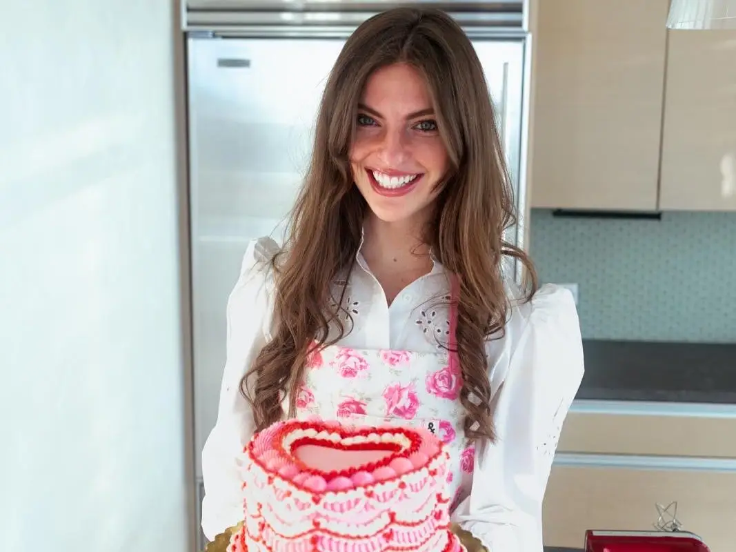 Allison Sheehan with a cake