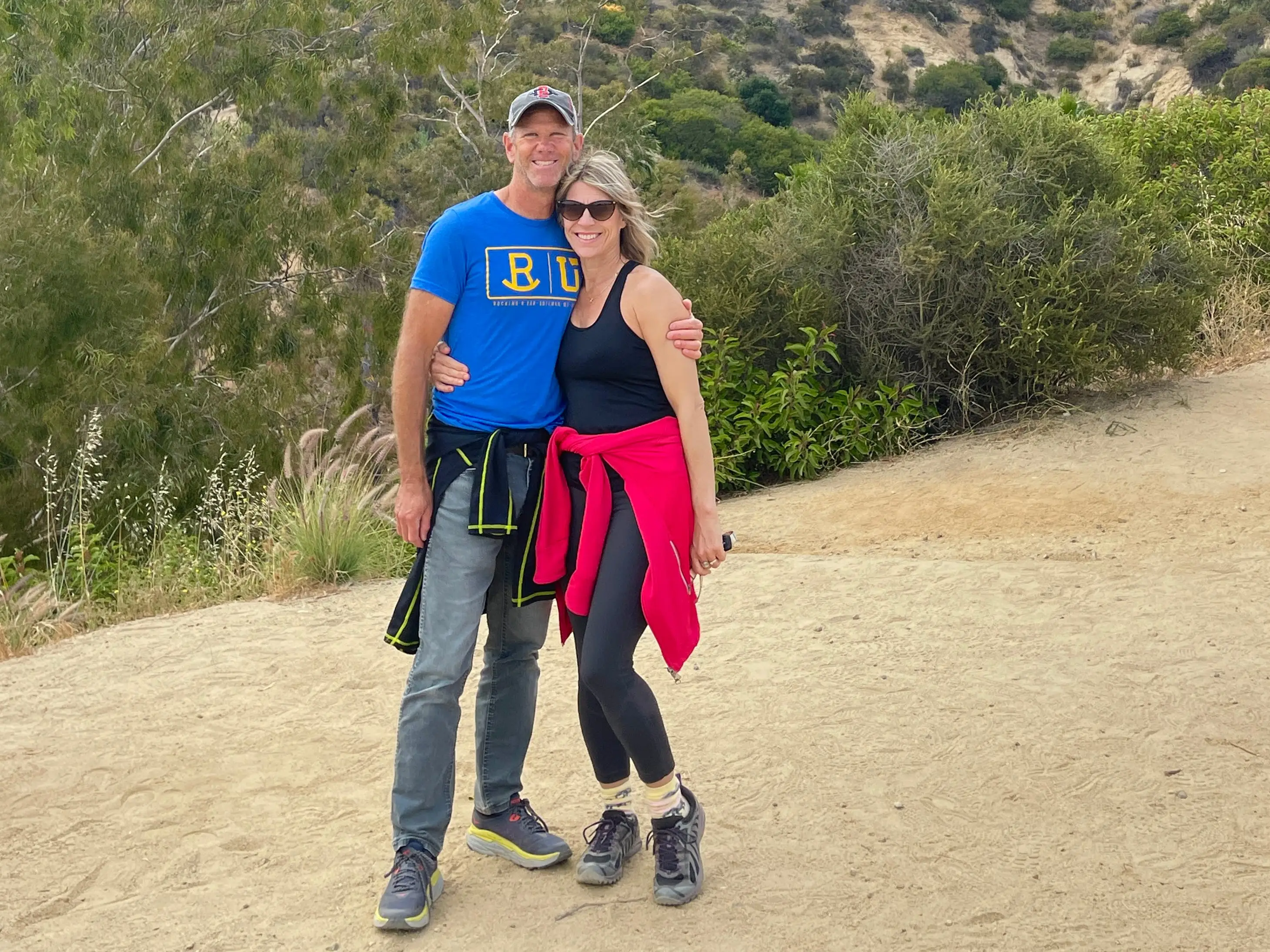 Couple smiling in los angeles on trail