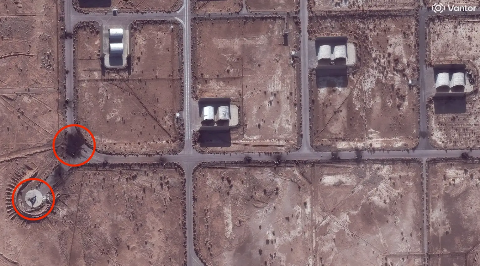 Multiple destroyed aircraft are seen at an Iranian base in March.