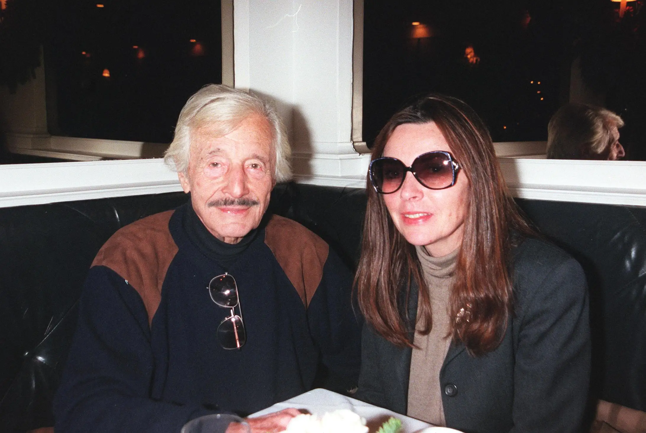 Oleg Cassini and Marianne Nestor at lunch in Manhattan in 2000, six years before the designer's death.