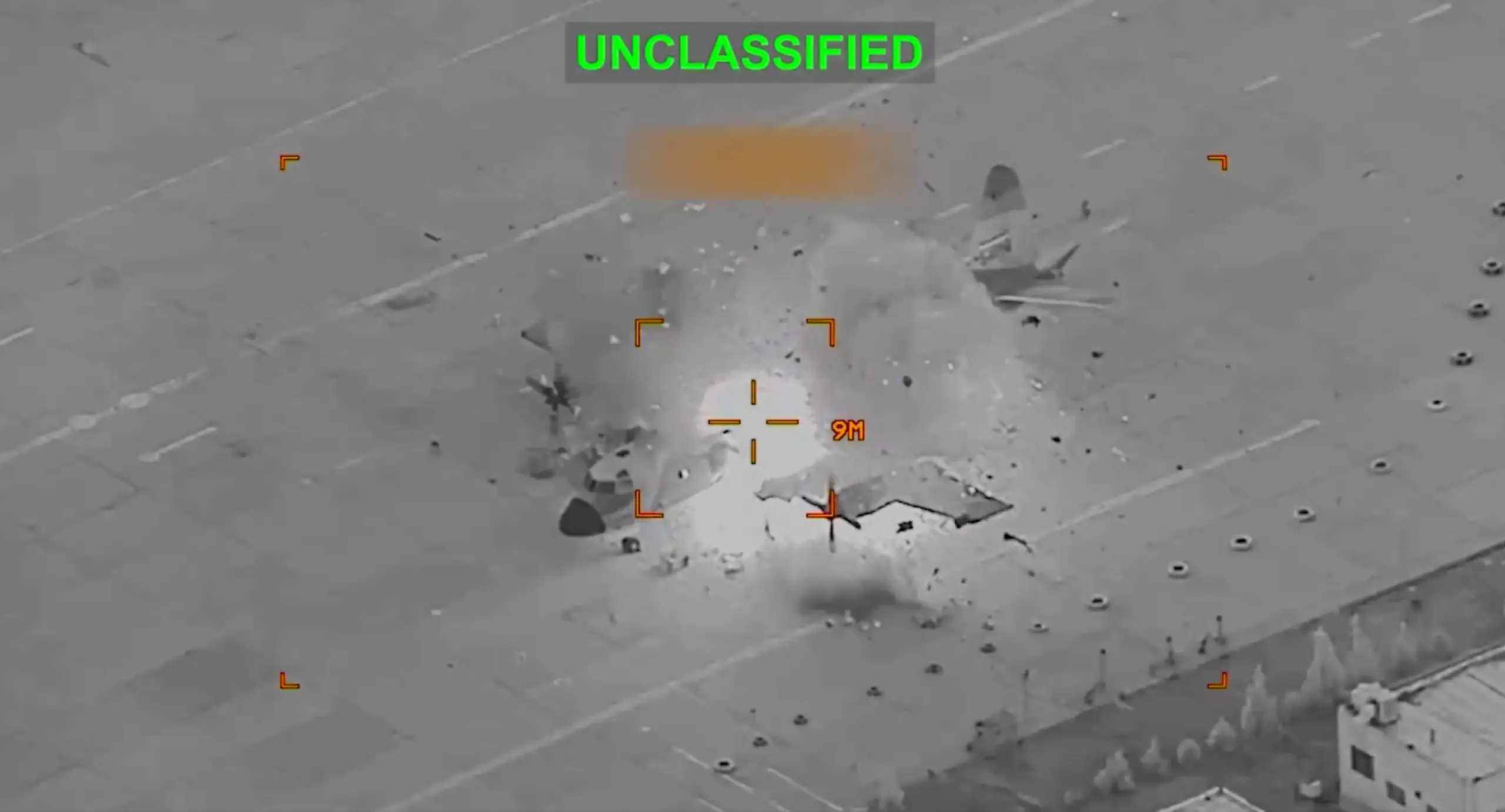 A P-3F Orion is struck by a munition on a runway.