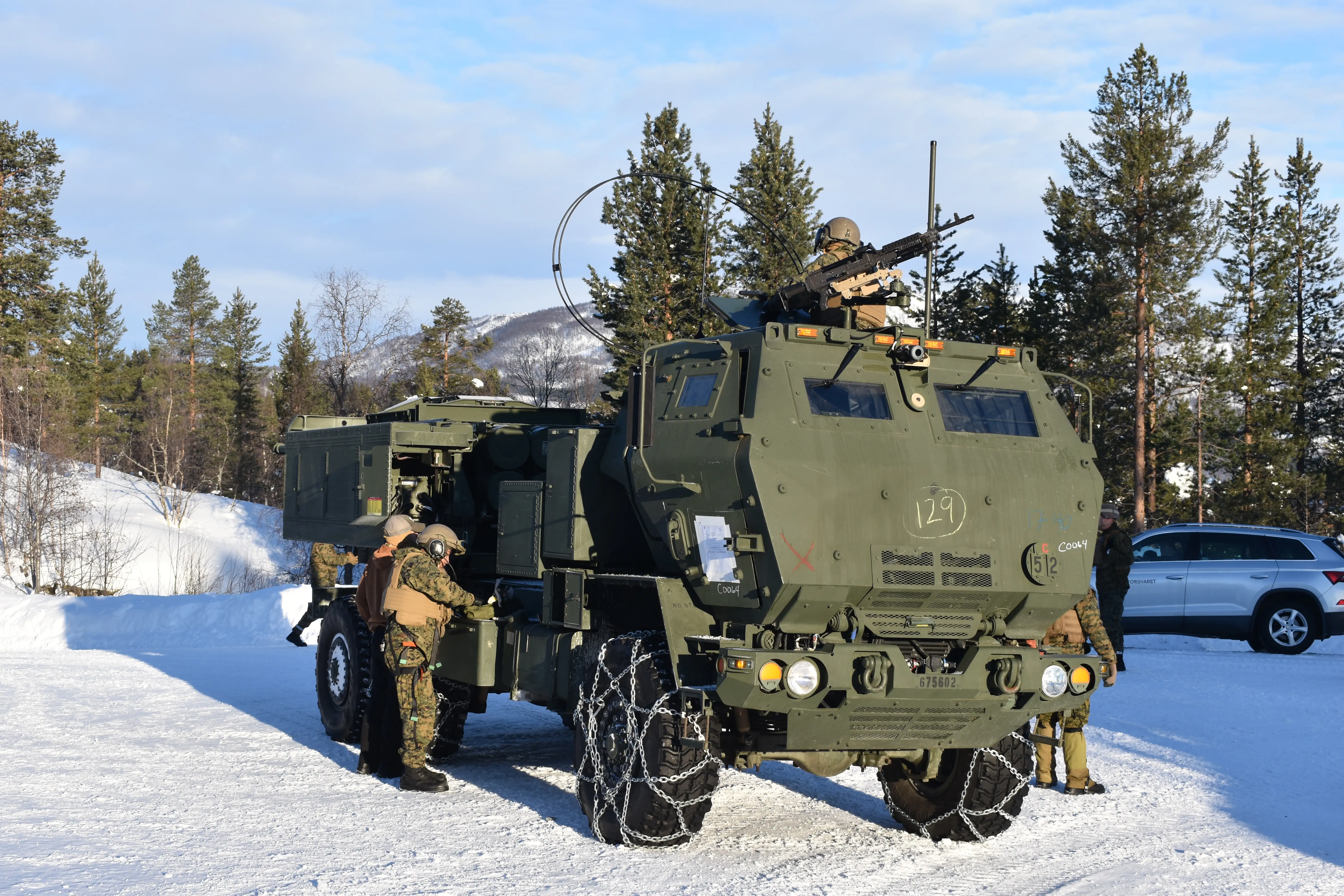 US Marines work on a HIMARS launcher in Norway in February.