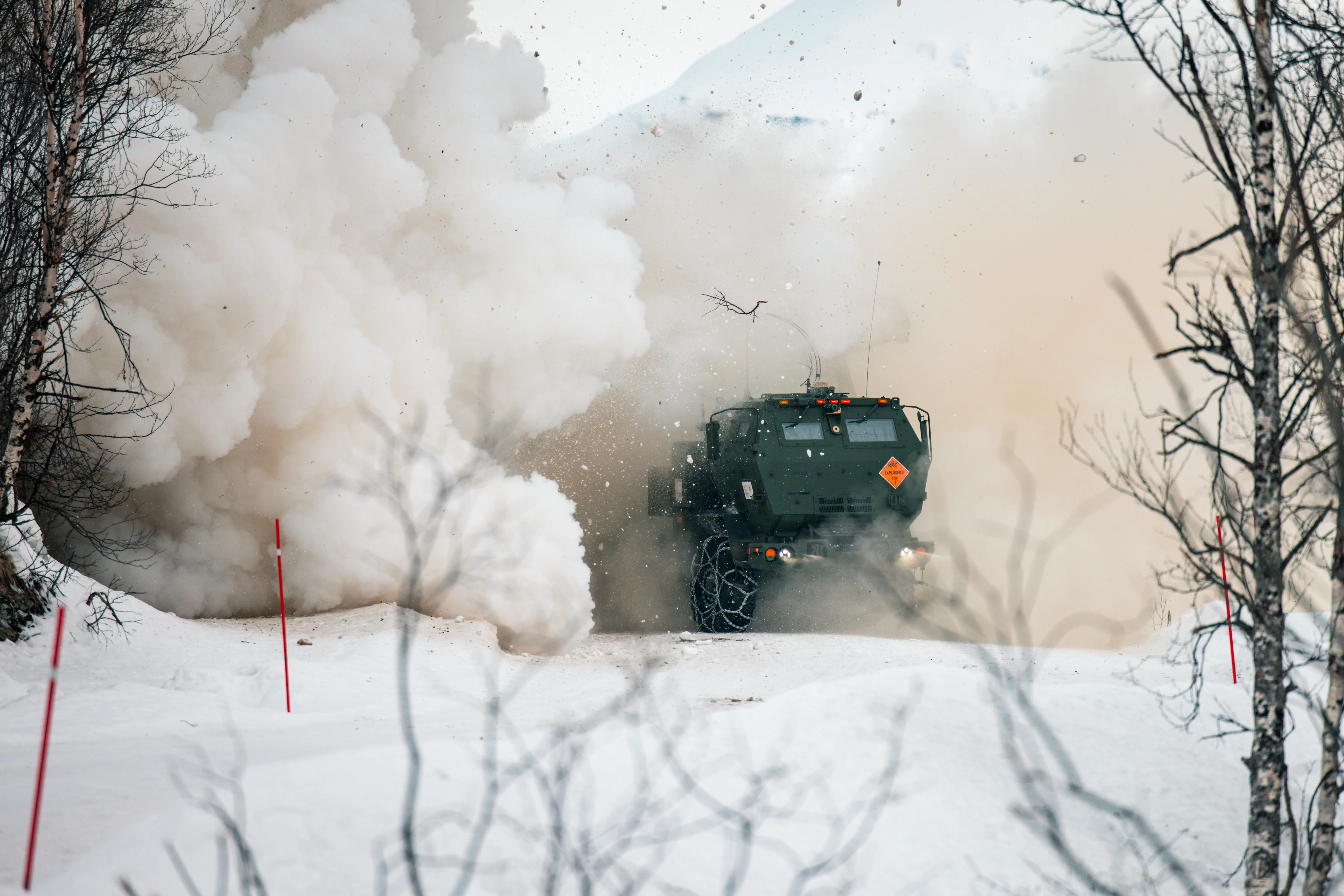US Marines with 2nd Battalion, 10th Marine Regiment, 2nd Marine Division, launch a High Mobility Artillery Rocket System during a live-fire training event in preparation for Exercise Nordic Response 24 in Setermoen, Norway, February 27, 2024.