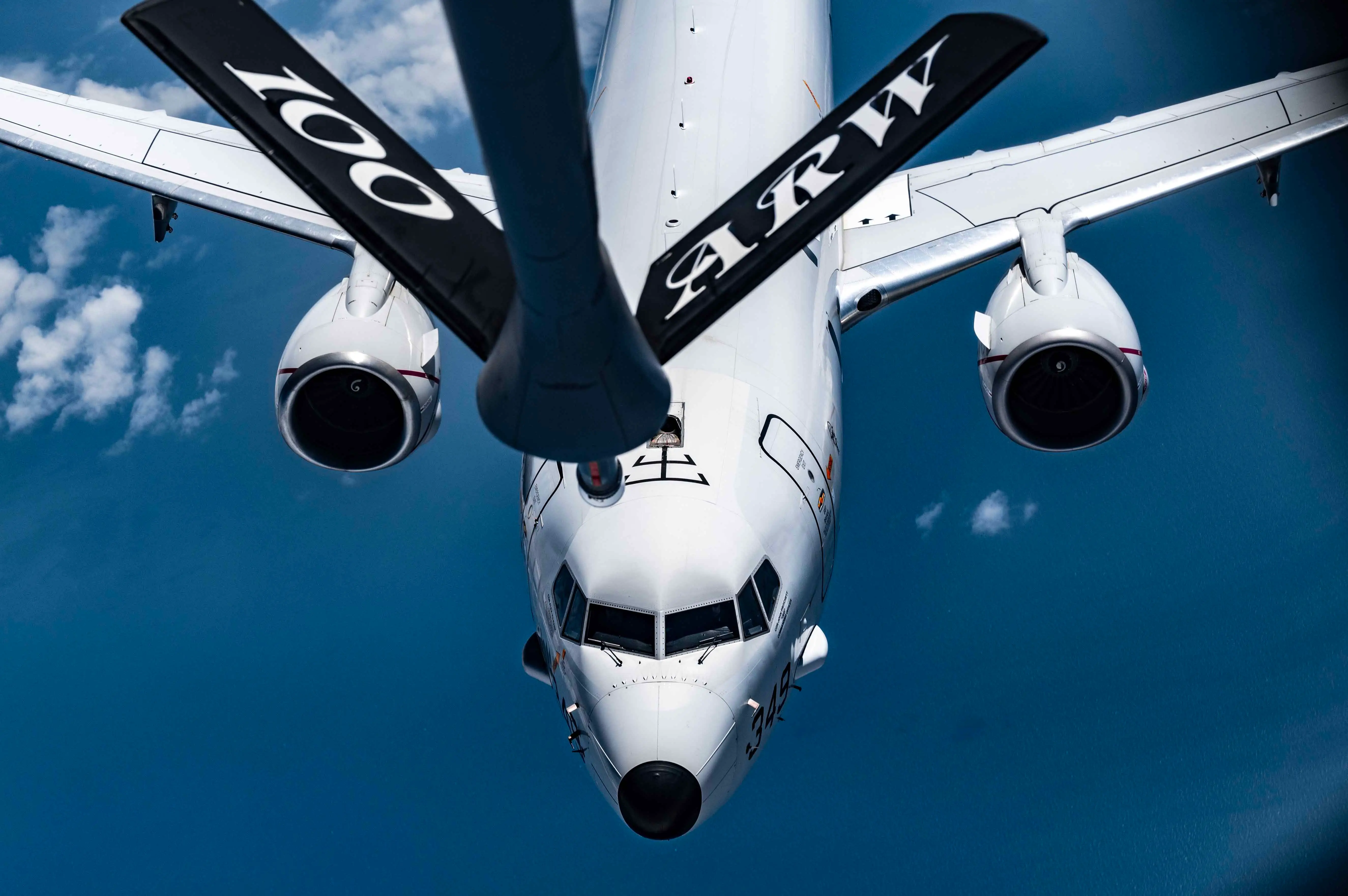 A US Air Force KC-135 Stratotanker aircraft provides aerial refueling to a US Navy P-8 Poseidon aircraft assigned to US Air Naval Station Keflavik Base, Iceland, over the North Sea region, Royal Air Force Mildenhall, England, June 21, 2023.