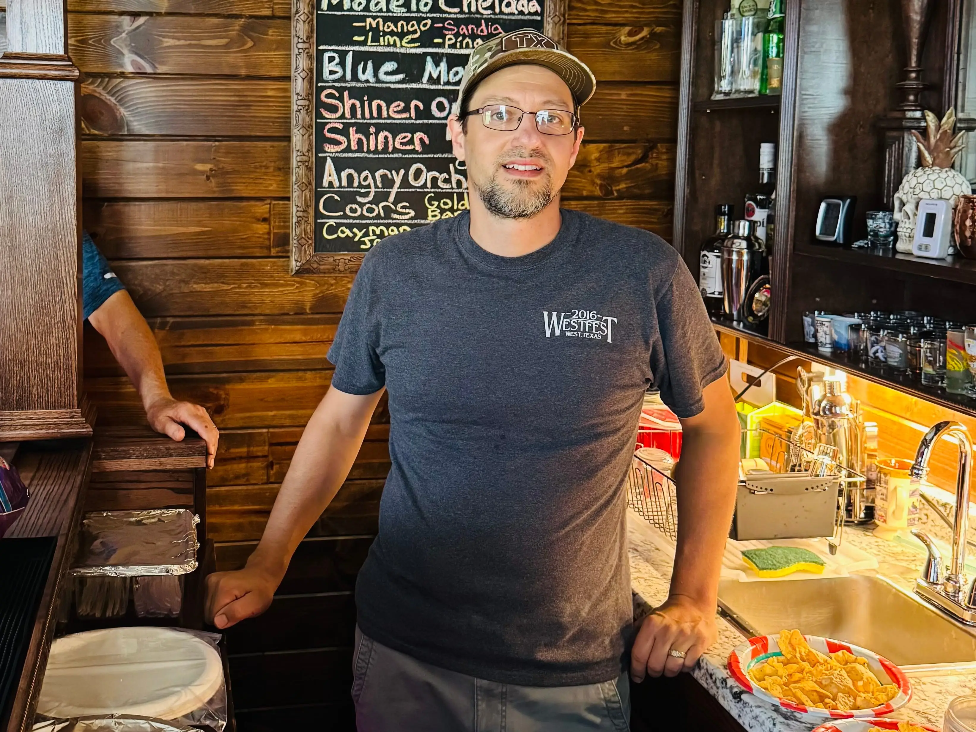 Stephen Hutyra inside his backyard pub.