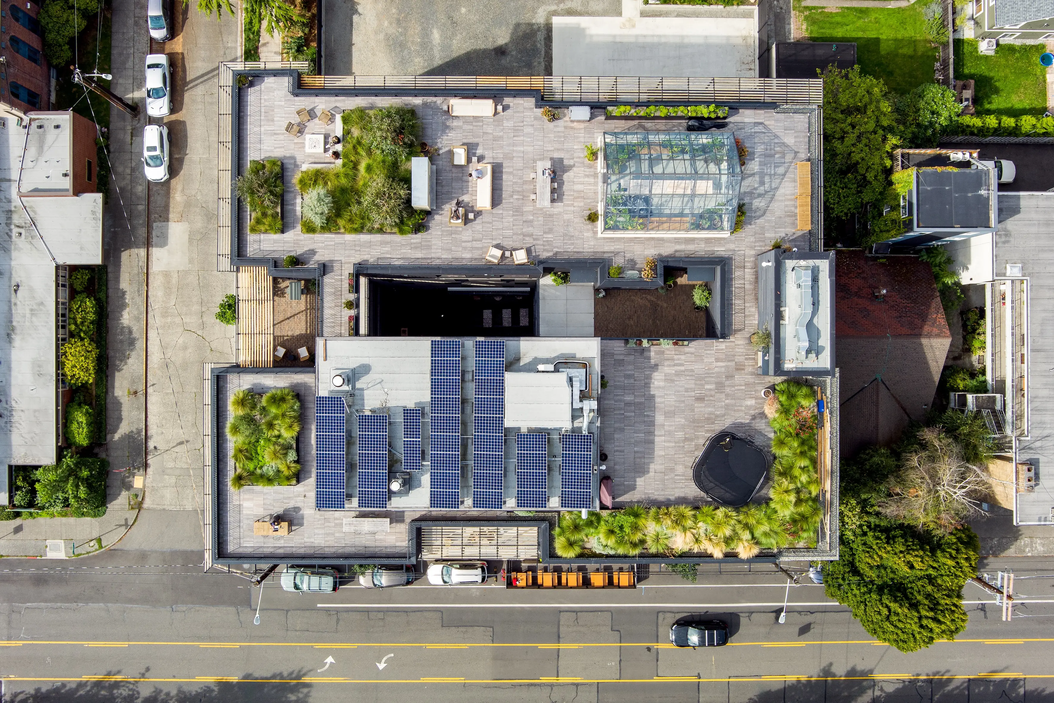 A top view of Shared Roof, featuring its solar panels and greenhouse.