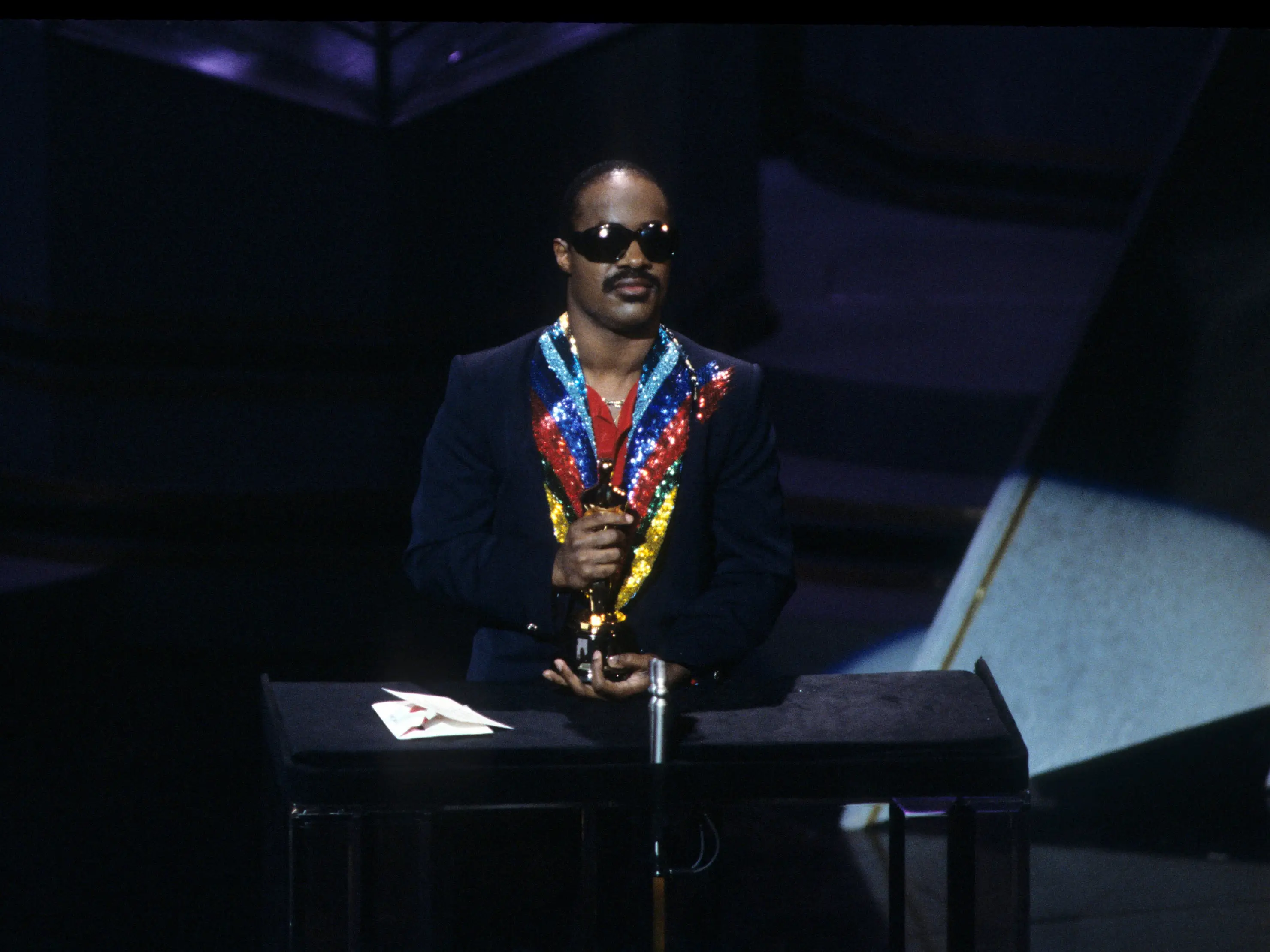Stevie Wonder accepting the Oscar for best original song in 1985.