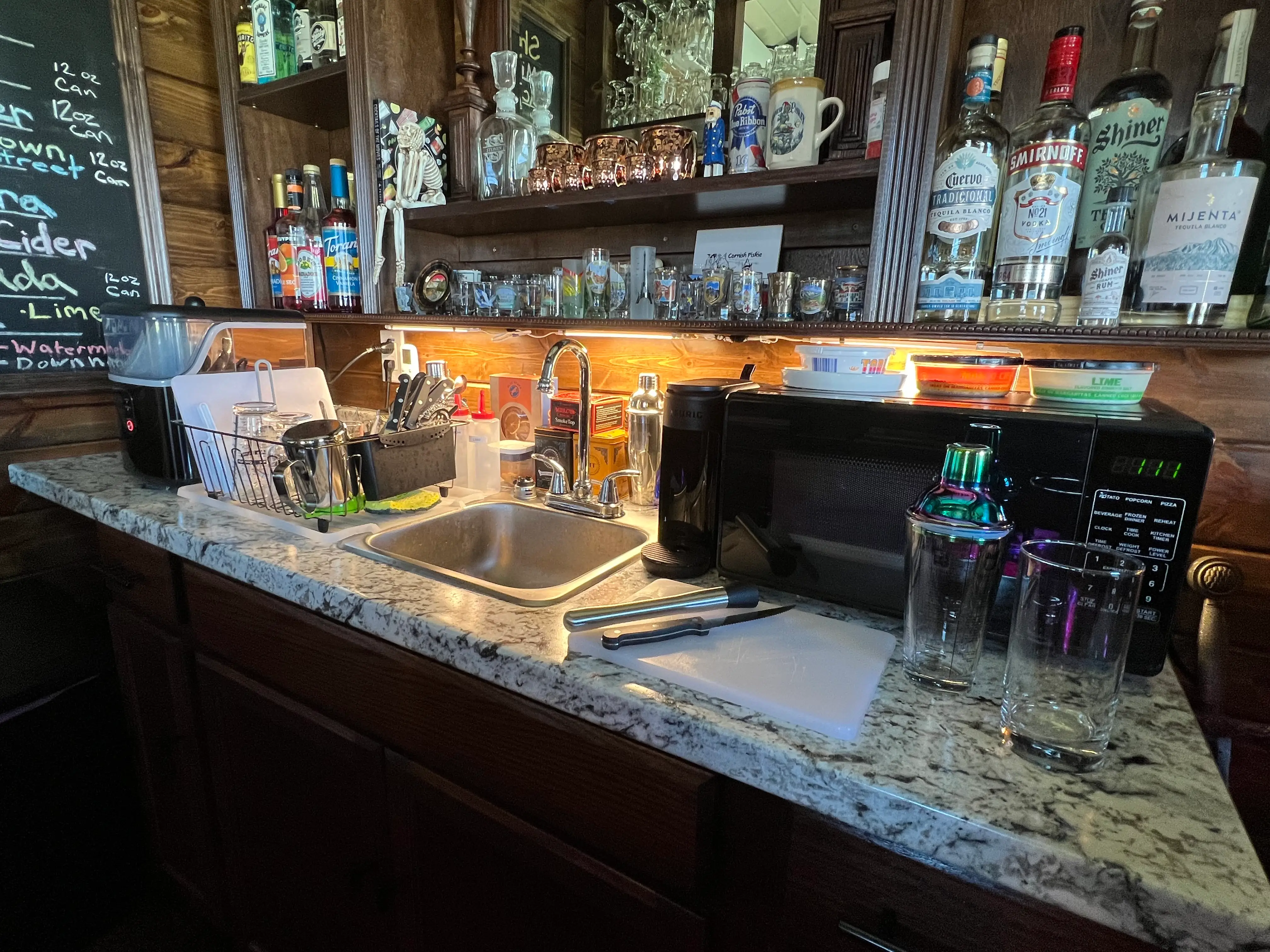 The cabinets and sink in Stephen Hutyra's backyard pub.