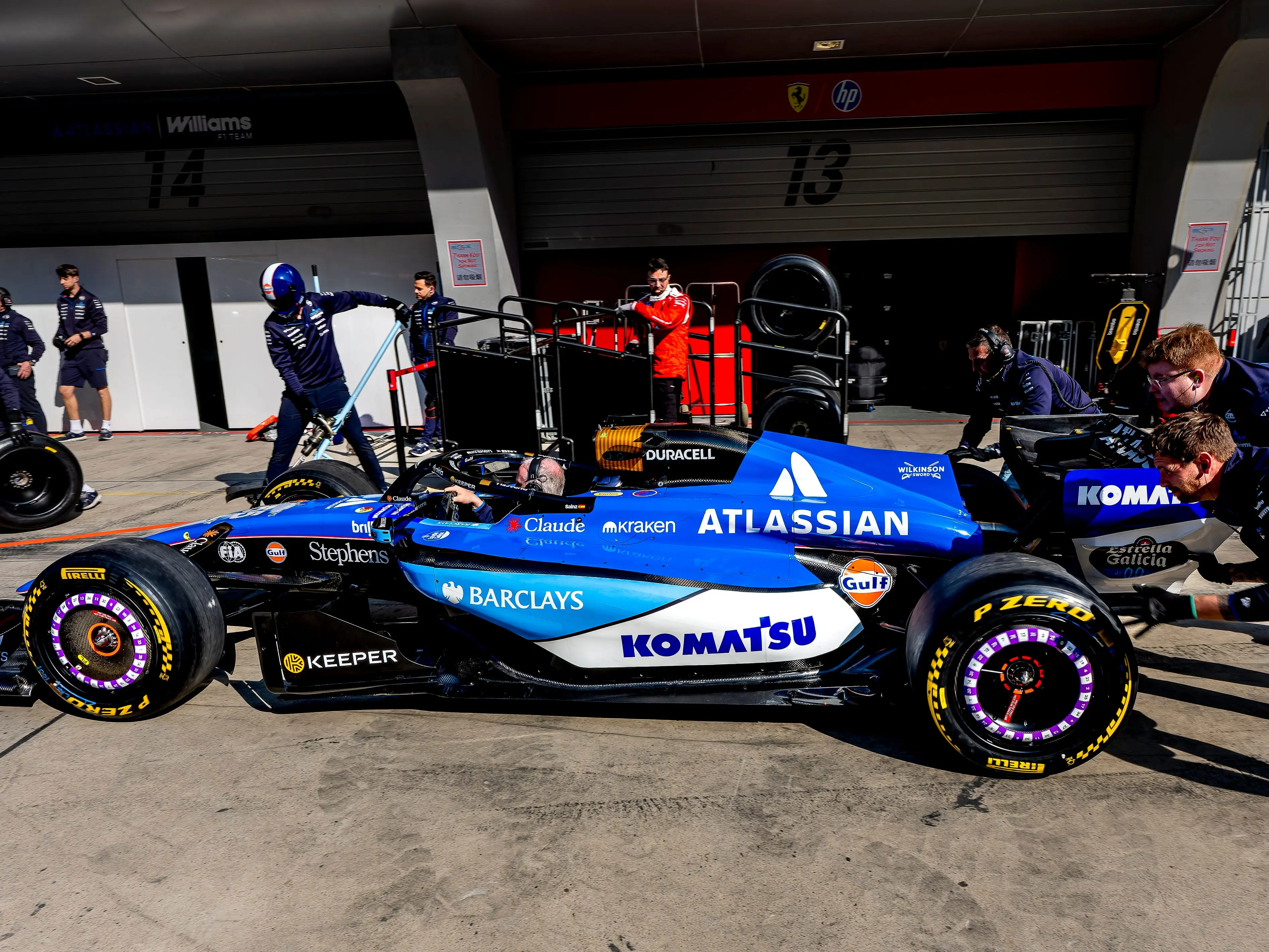 The Atlassian logo on a Formula 1 car