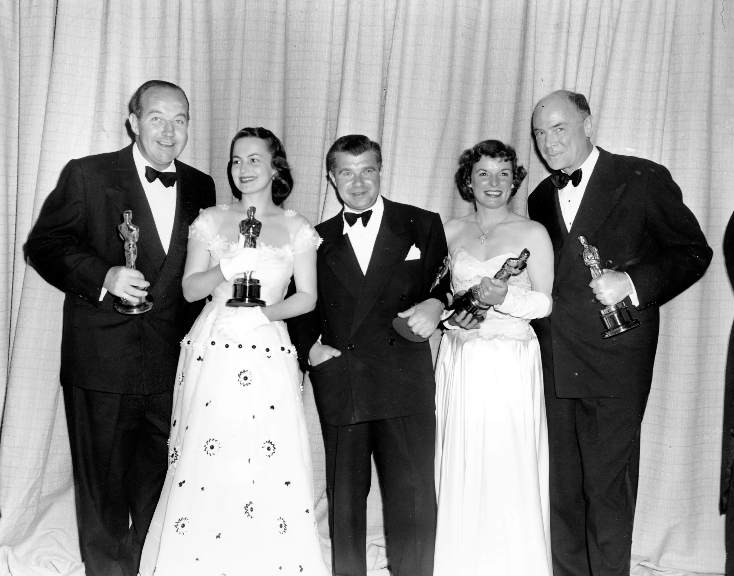 Broderick Crawford, Olivia de Havilland, Robert Rossen, Mercedes McCambridge, and Dean Jagger at the 1950 Oscars