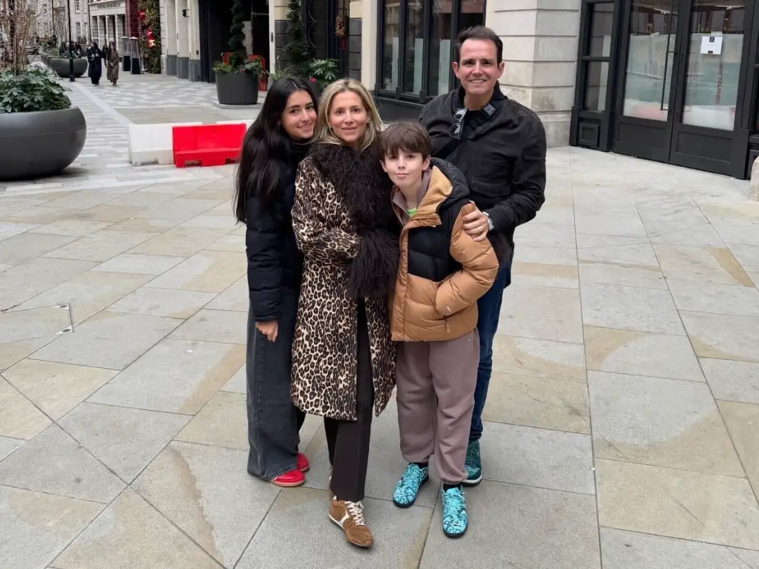 family posing for photo