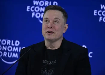 Elon Musk says Tesla expects to increase its human workforce as AI and robotics boost productivity