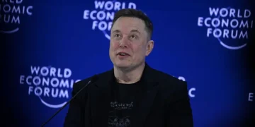 Elon Musk says Tesla expects to increase its human workforce as AI and robotics boost productivity