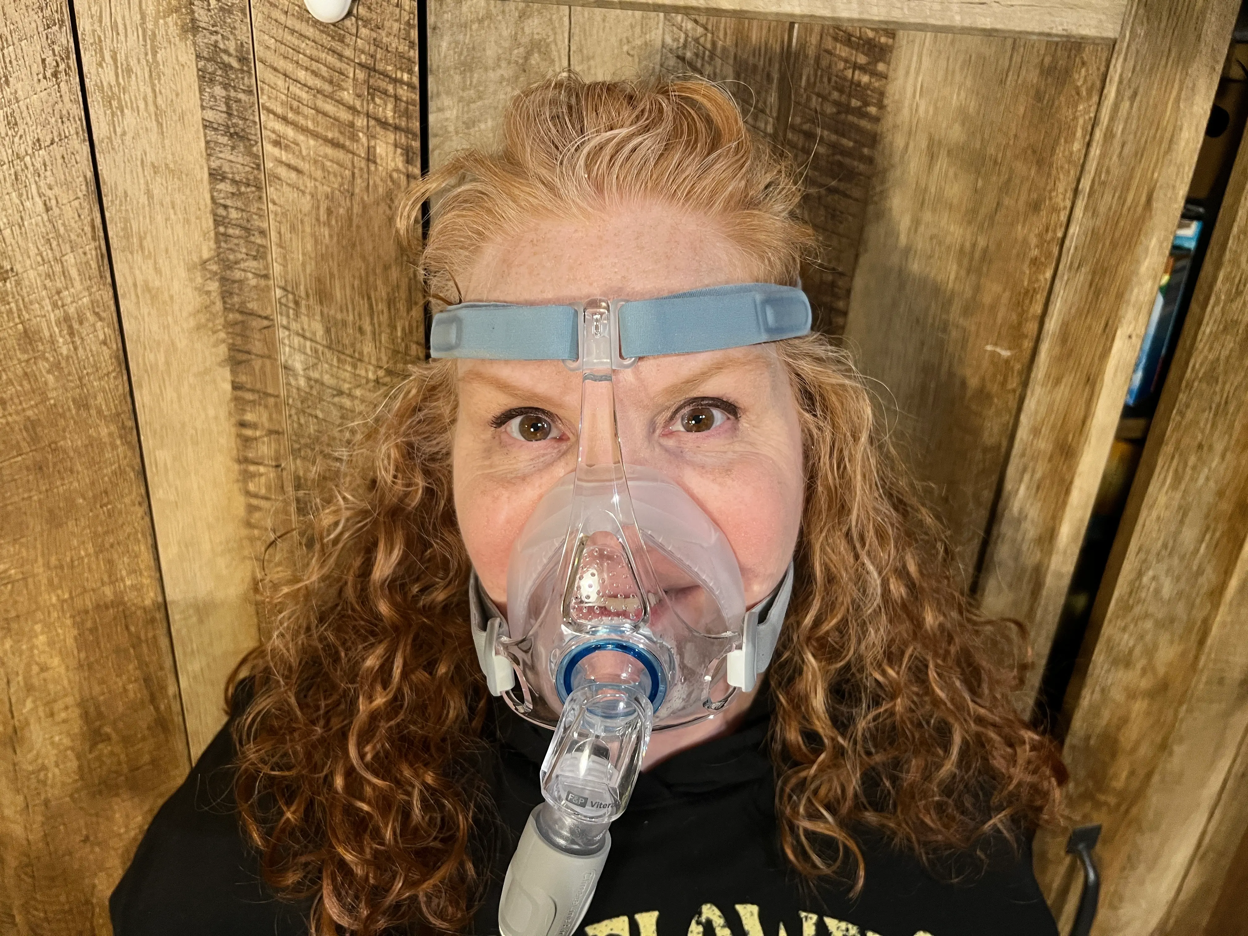 Woman wearing CPAP machine