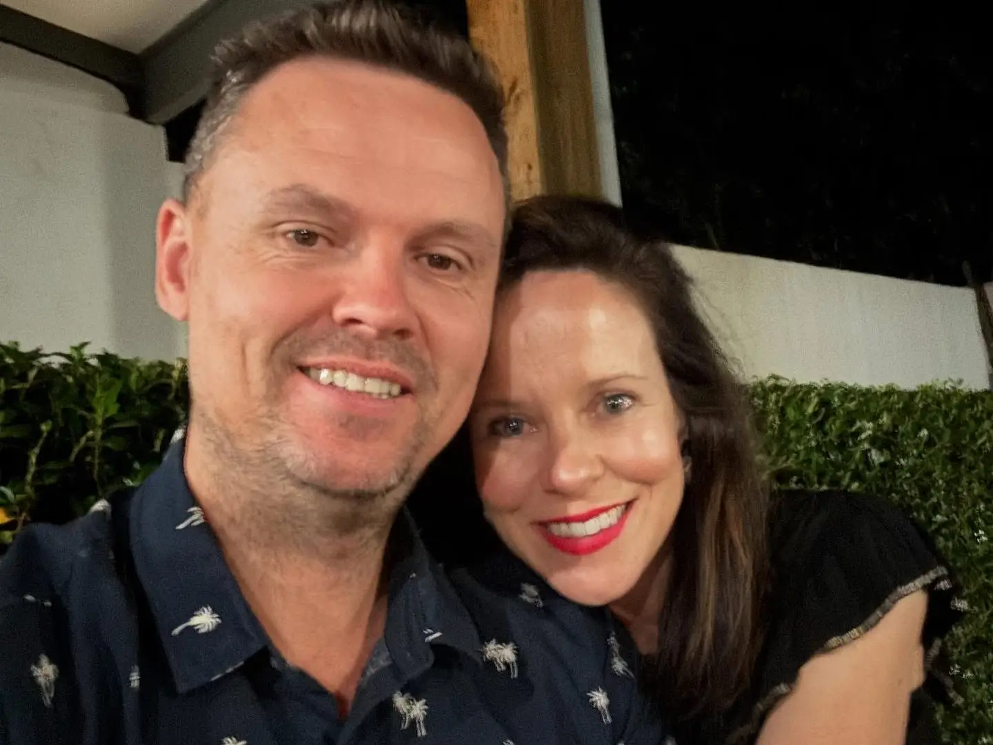 Two people smiling in selfie